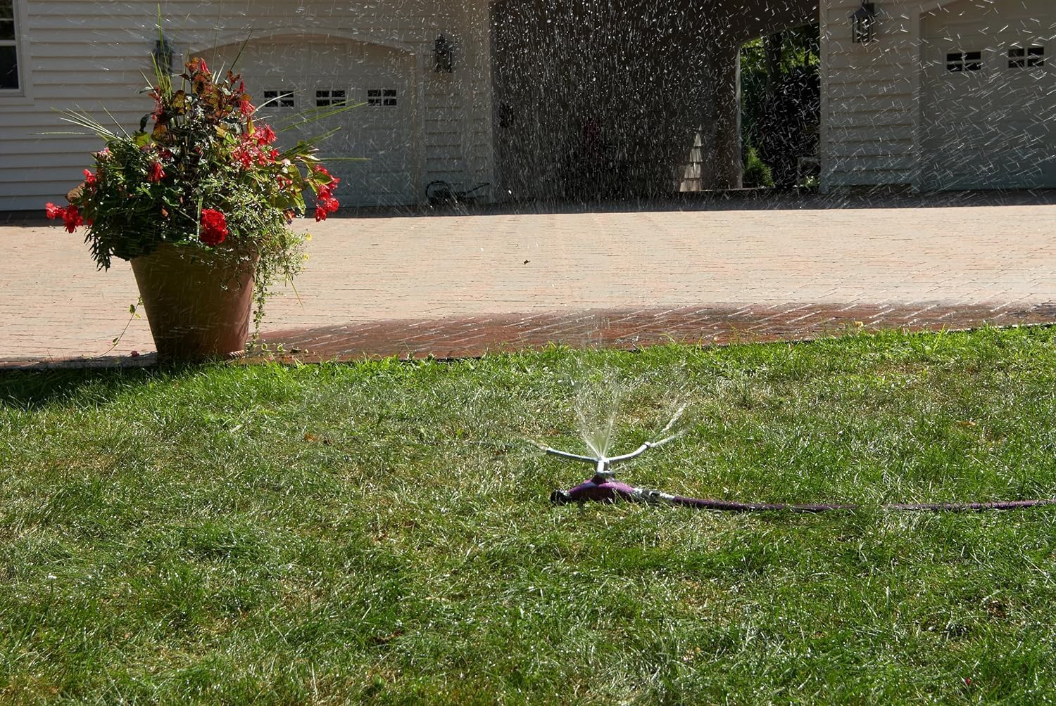 Dramm 15051 Colorstorm Premium 3-Arm Whirling Sprinkler with Heavy Duty Metal Wheeled Base, Red image number 5