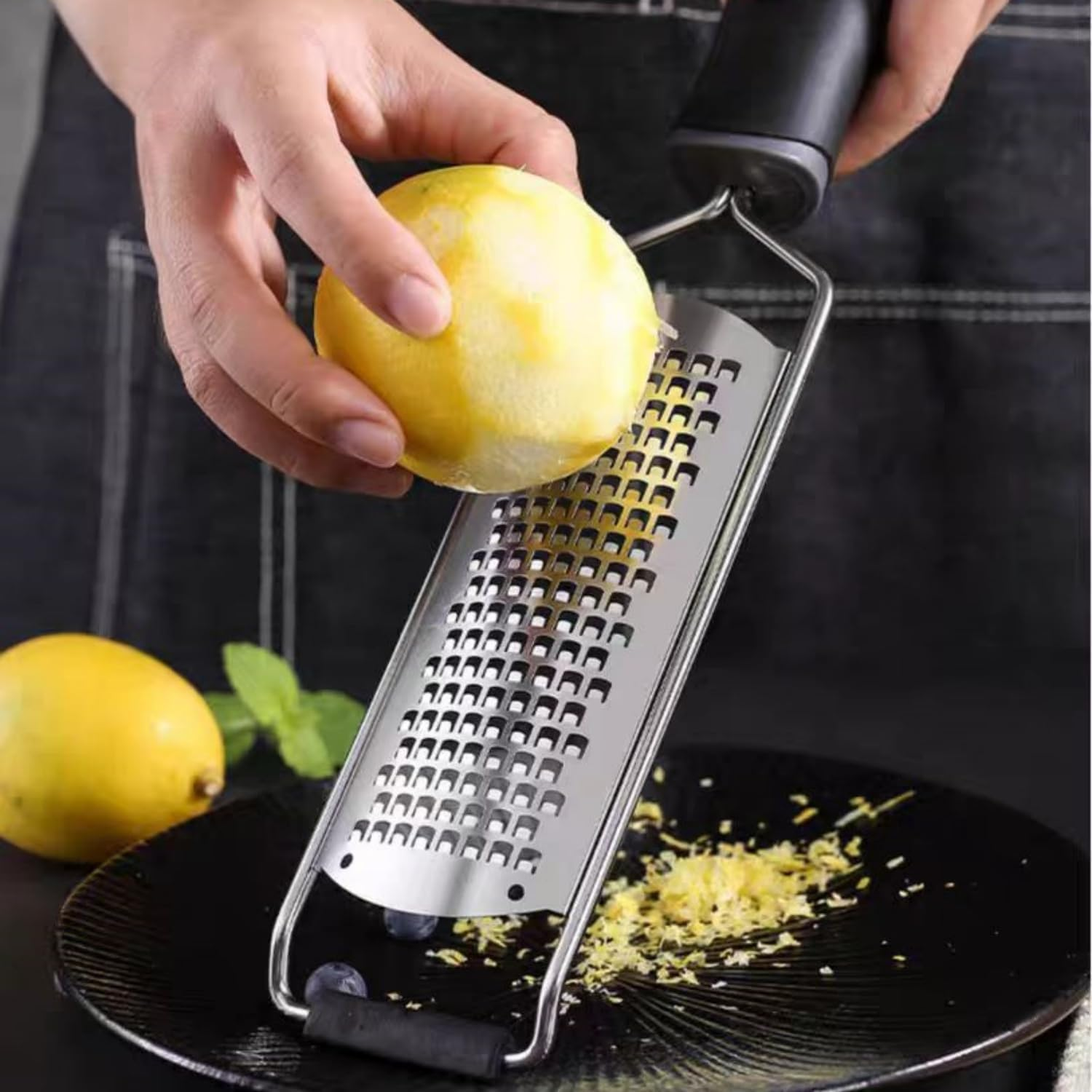 Stainless Steel Lemon & Cheese Grater - Professional Grater for Fruits, Vegetables & Chocolate - Includes Protective Sleeve & Cleaning Brush - Black