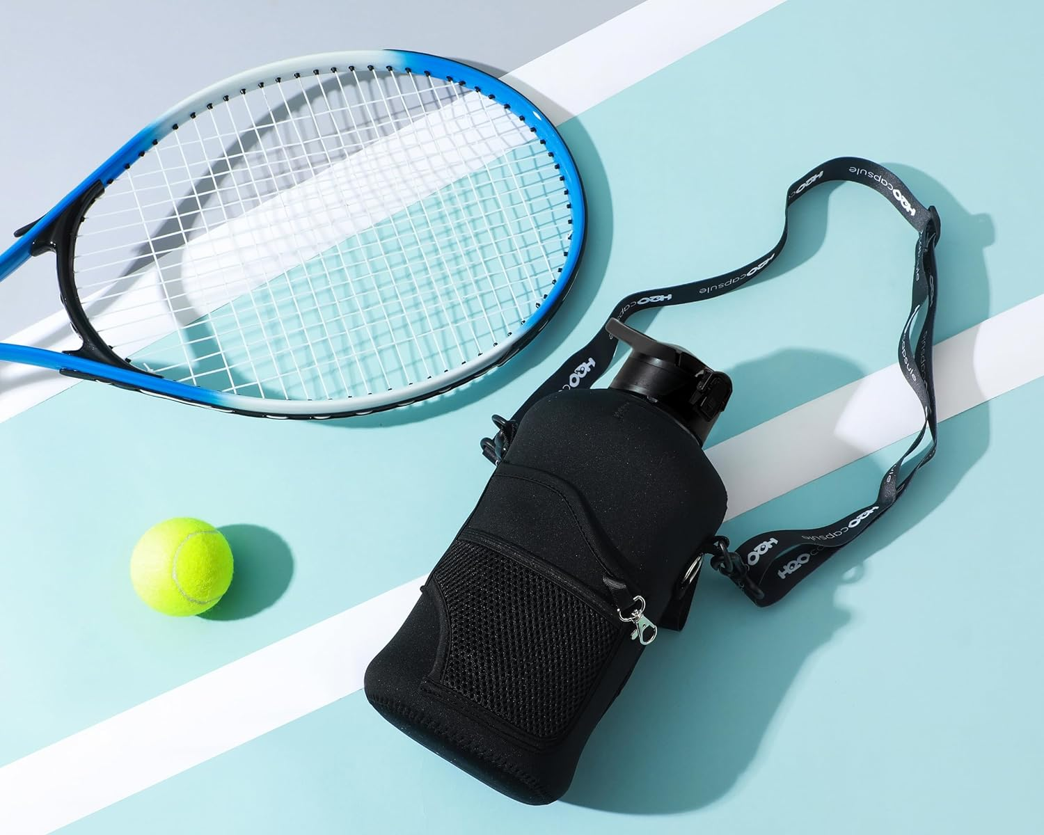 H2O Capsule 2.2L Half Gallon Water Bottle with Storage Sleeve and Removable Straw &ndash; BPA Free Large Reusable Drink Container with Handle - Big Sports Jug, 2.2 Liter (74 Ounce), Jet Black image number 1