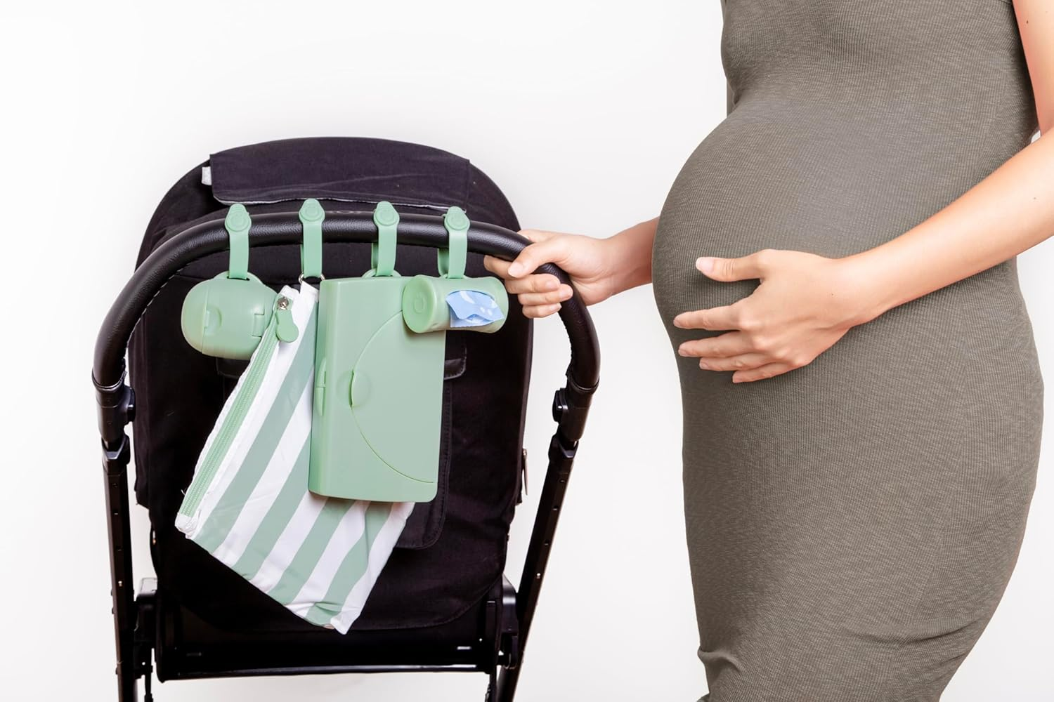 Ubbi On-The-Go Diapering Gift Set, Includes Changing Mat and Bag, Wipes Dispenser, Pacifier Holder and Bag Dispenser, Newborn Essentials, Sage image number 4