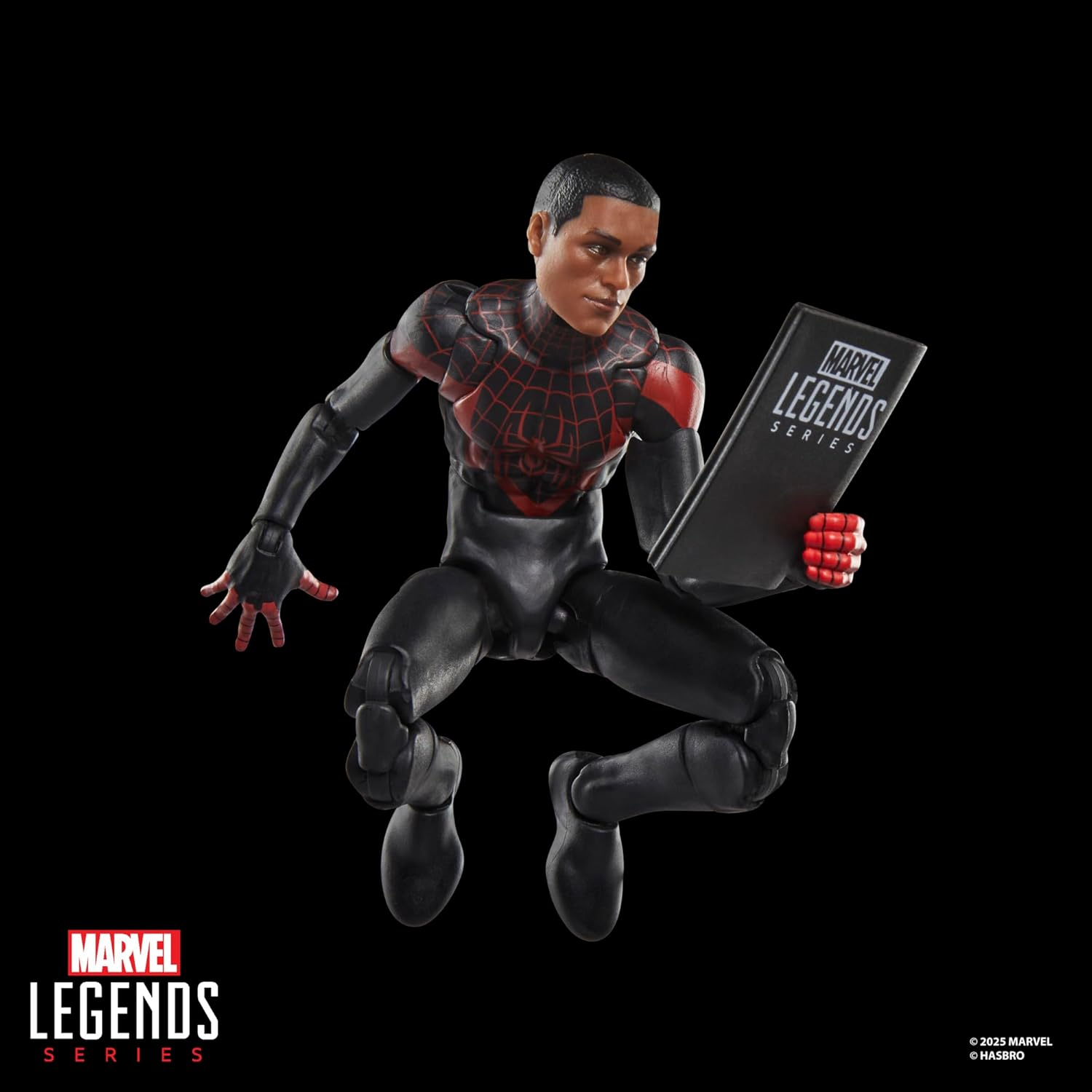 Marvel Legends Series Ultimate Miles Morales, Spider-Man Comics-Inspired Collectible 6-Inch Scale Action Figure with Character-Sized Comic Accessory image number 3