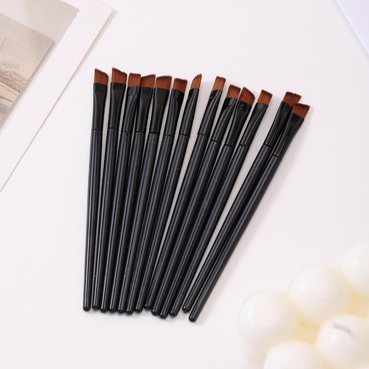 100 PCS Compact Eyebrow, Lip, and Eye Shadow Makeup Brush with Angled Tip, 10Cm Length, Black Plastic Handle, Portable Beauty Tool for Precise Application image number 3