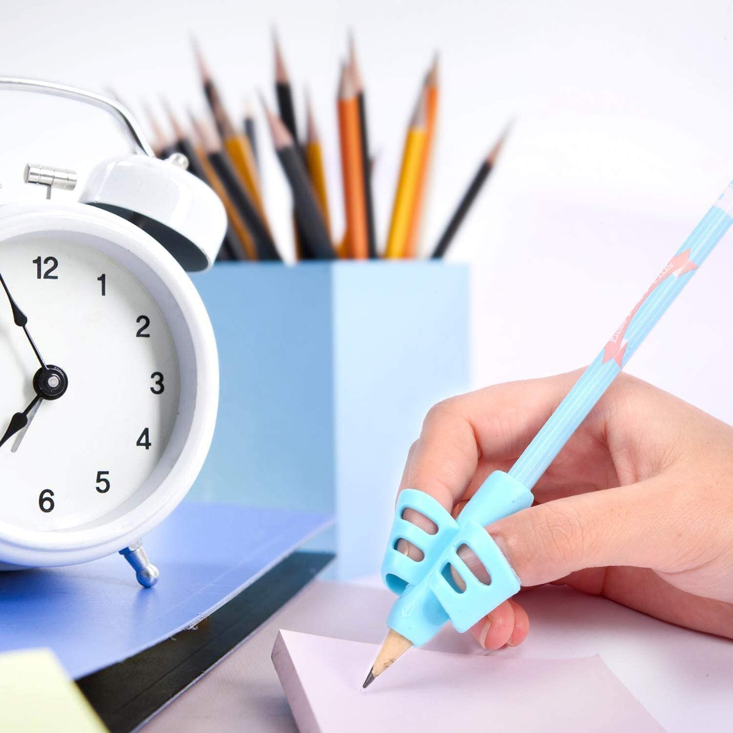 4 Pcs Pencil Grip Set, Children Pen Writing Aid Grips Set Posture Correction Tool for Kids Preschoolers Children, Hollow Ventilation (4 Pack, 4 Colors) image number 4