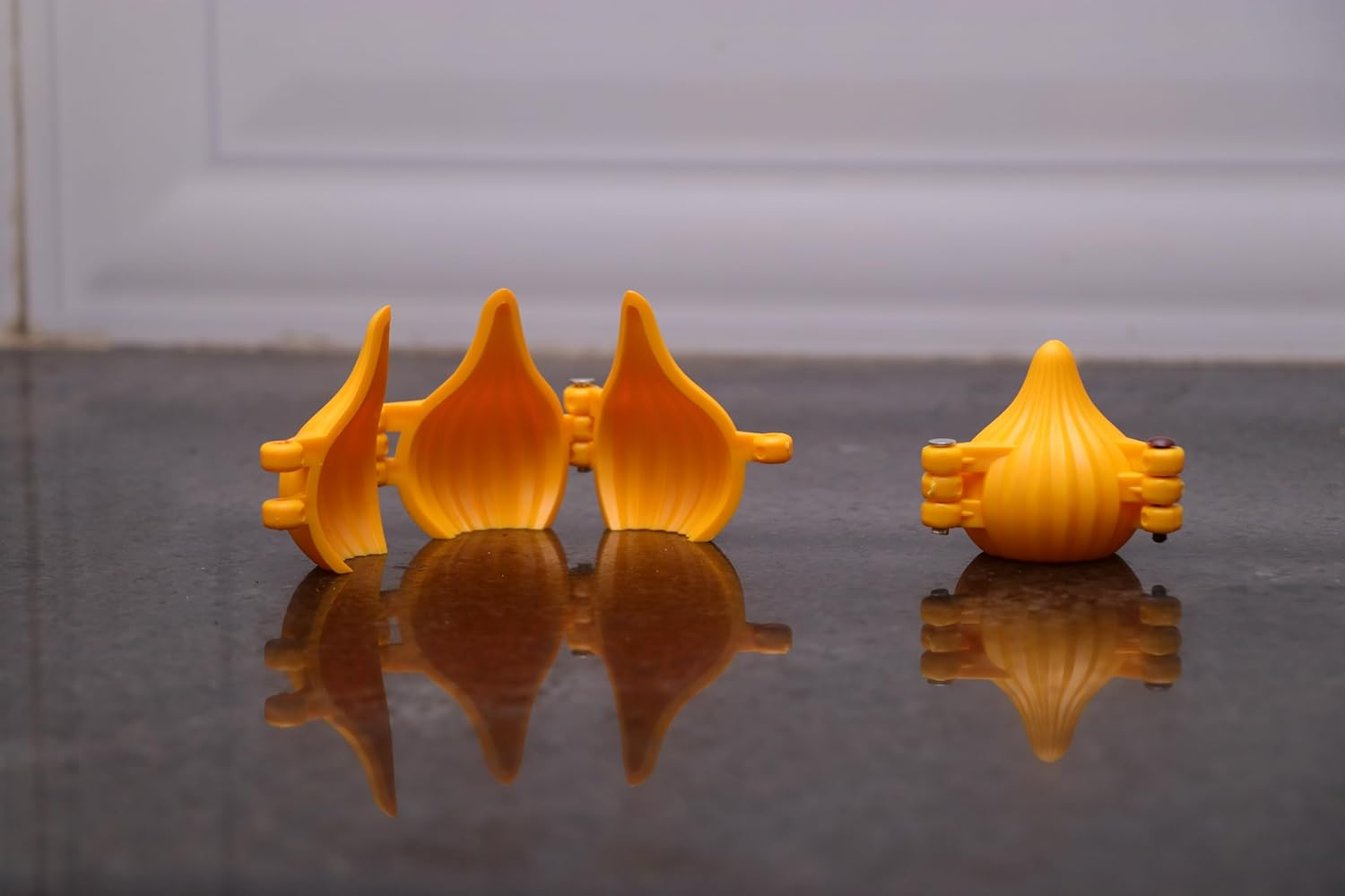 Garden of Arts Plastic 2 Pieces Small and Medium 3 Fold Modak Maker Mould for Ganpati, Diwali, Dussehra, and Other Festival, Orange,7X7X2 Cm image number 5