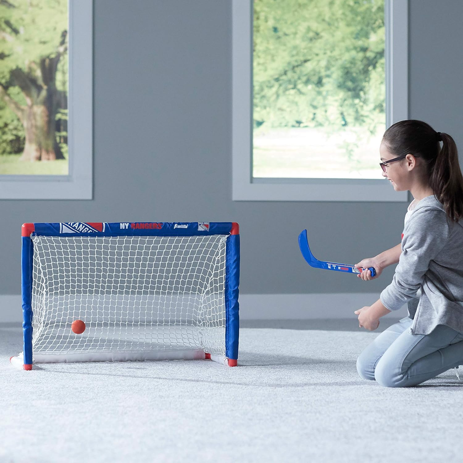 Franklin Sports NHL Mini Hockey Sets - Knee Hockey Goal, Ball, & 2 Hockey Stick Combo Set - Mini Goal Net - NHL Official Hockey Sets image number 1