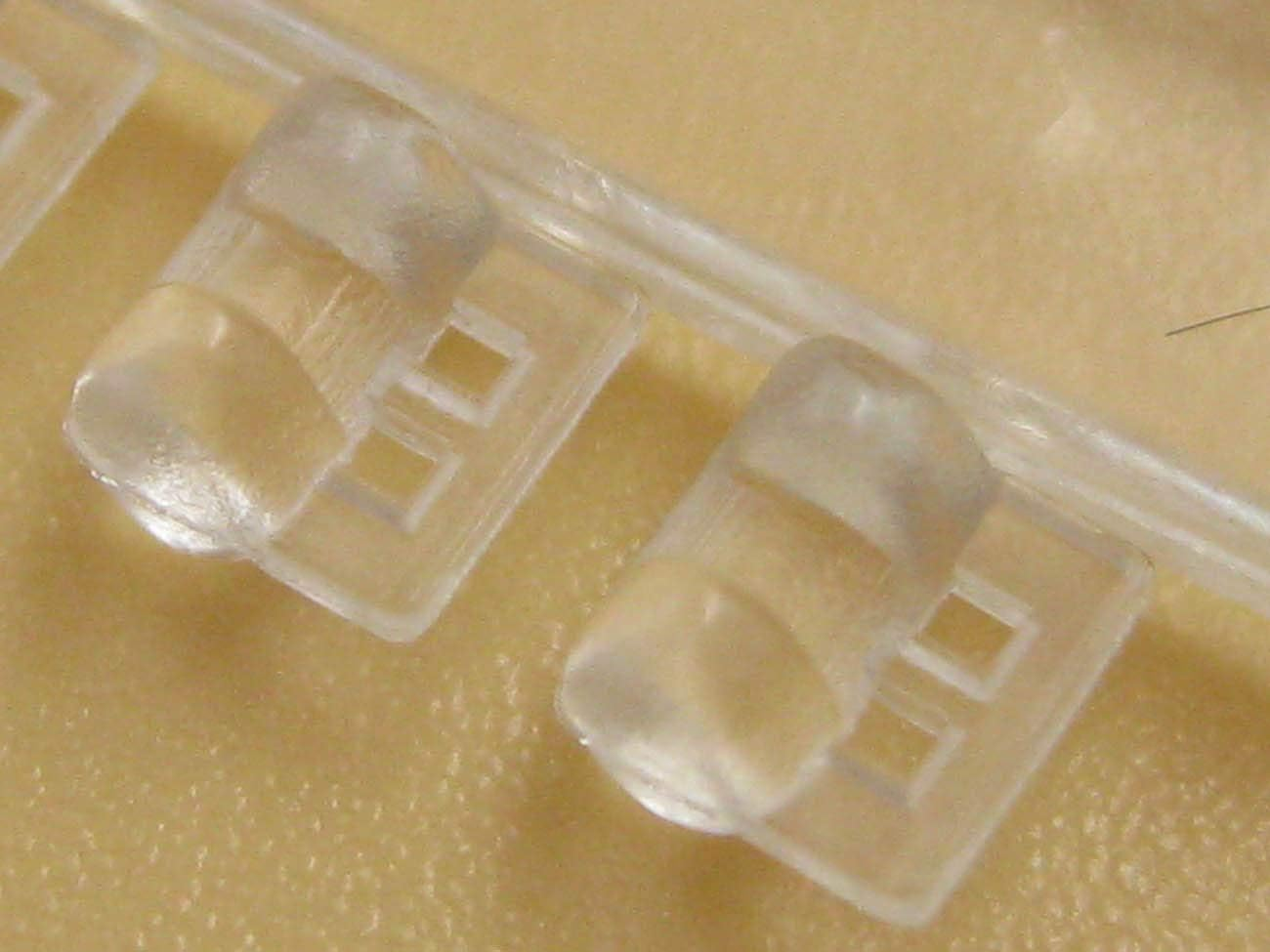 100Pcs Orthodontic Rotation Wedges Ligature Rotary Pad Dental Elastic Rubber Bands (Clear) image number 2