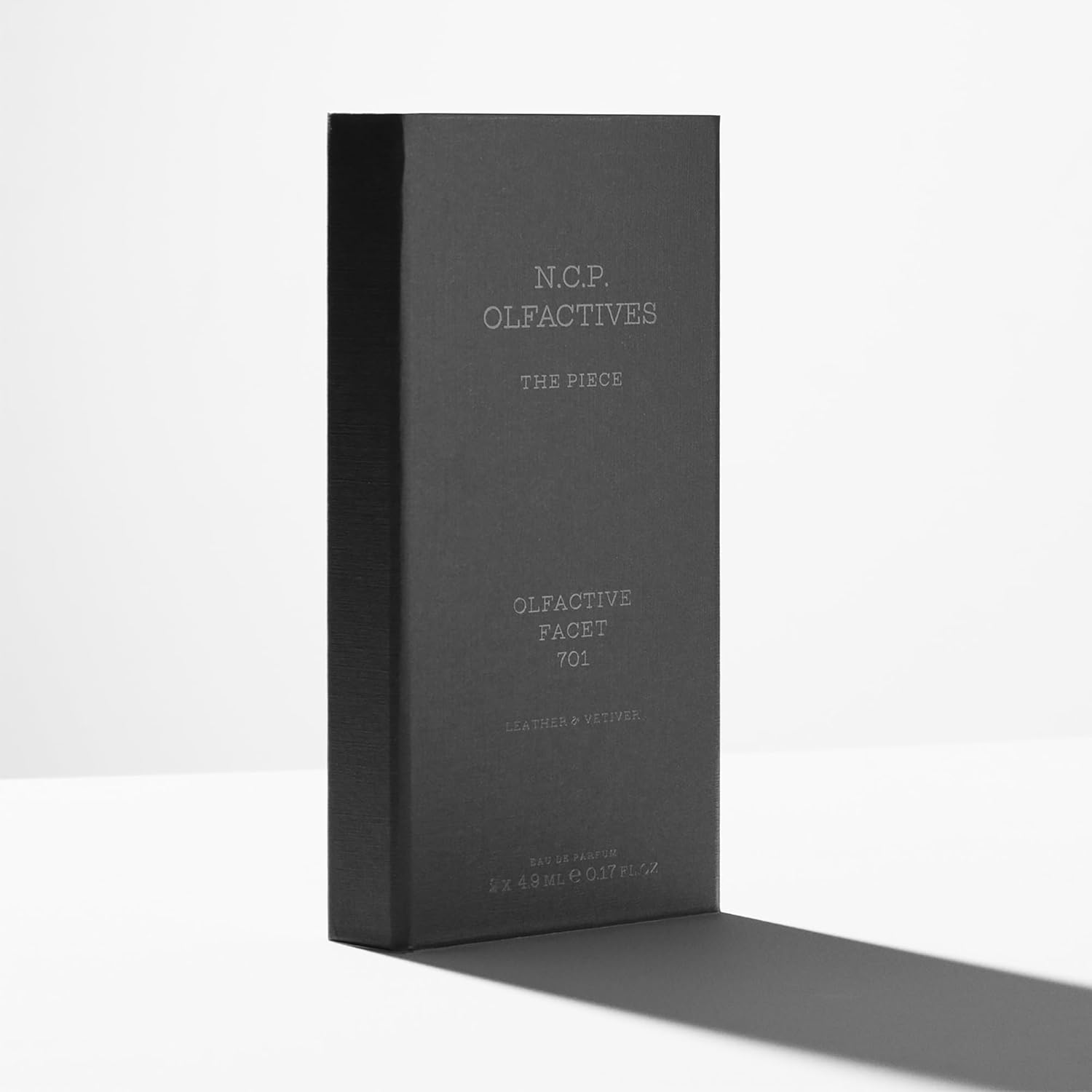 The Piece - Black by NCP for Unisex - 3 Pc 2 X 4.9Ml Olfactive Facet -701 Leather and Vetiver EDP Roll On, Necklace image number 2