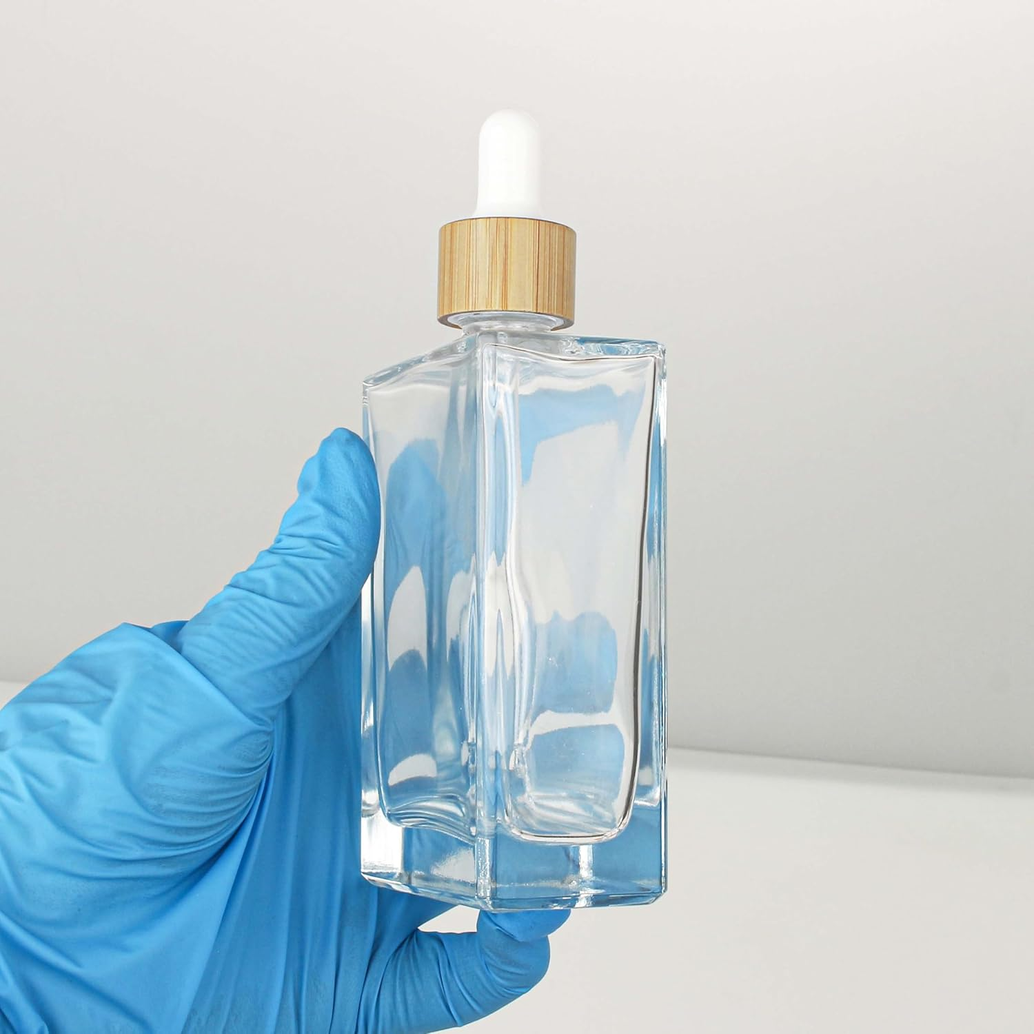 COSIDEA 3 Pcs Empty 3.33Oz / 100Ml Empty Clear Flat Glass Dropper Bottles Droppers for Oils Bamboo Cap Essential Oil Bottle Travel Serum Containers image number 6