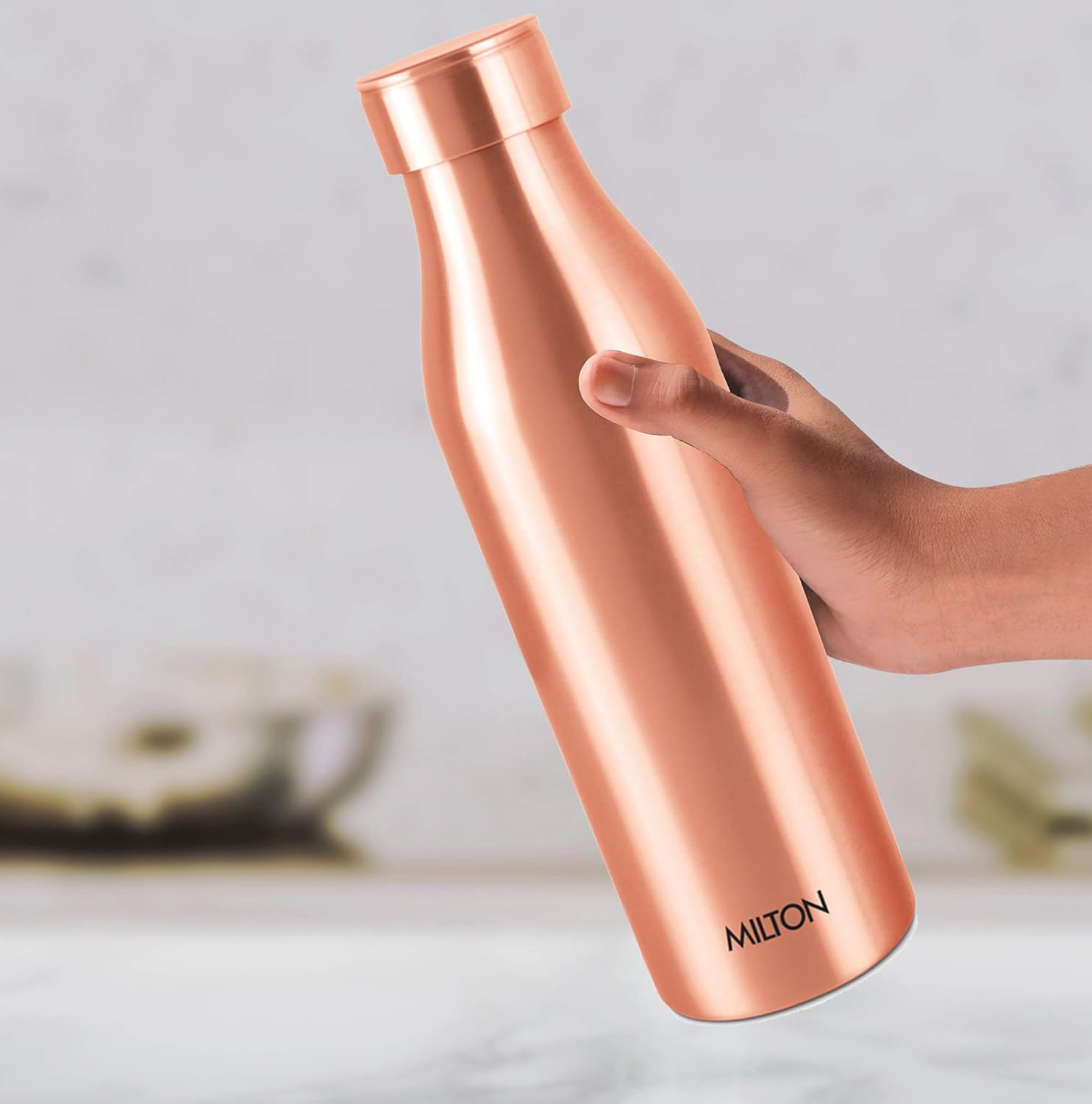 Milton Copper Water Bottle 34 Oz Extra Large - an Ayurvedic Pure Copper Vessel, Drink More Water, Lower Your Sugar Intake and Enjoy the Health Benefits Immediately- 960 Ml Copper Charge image number 4
