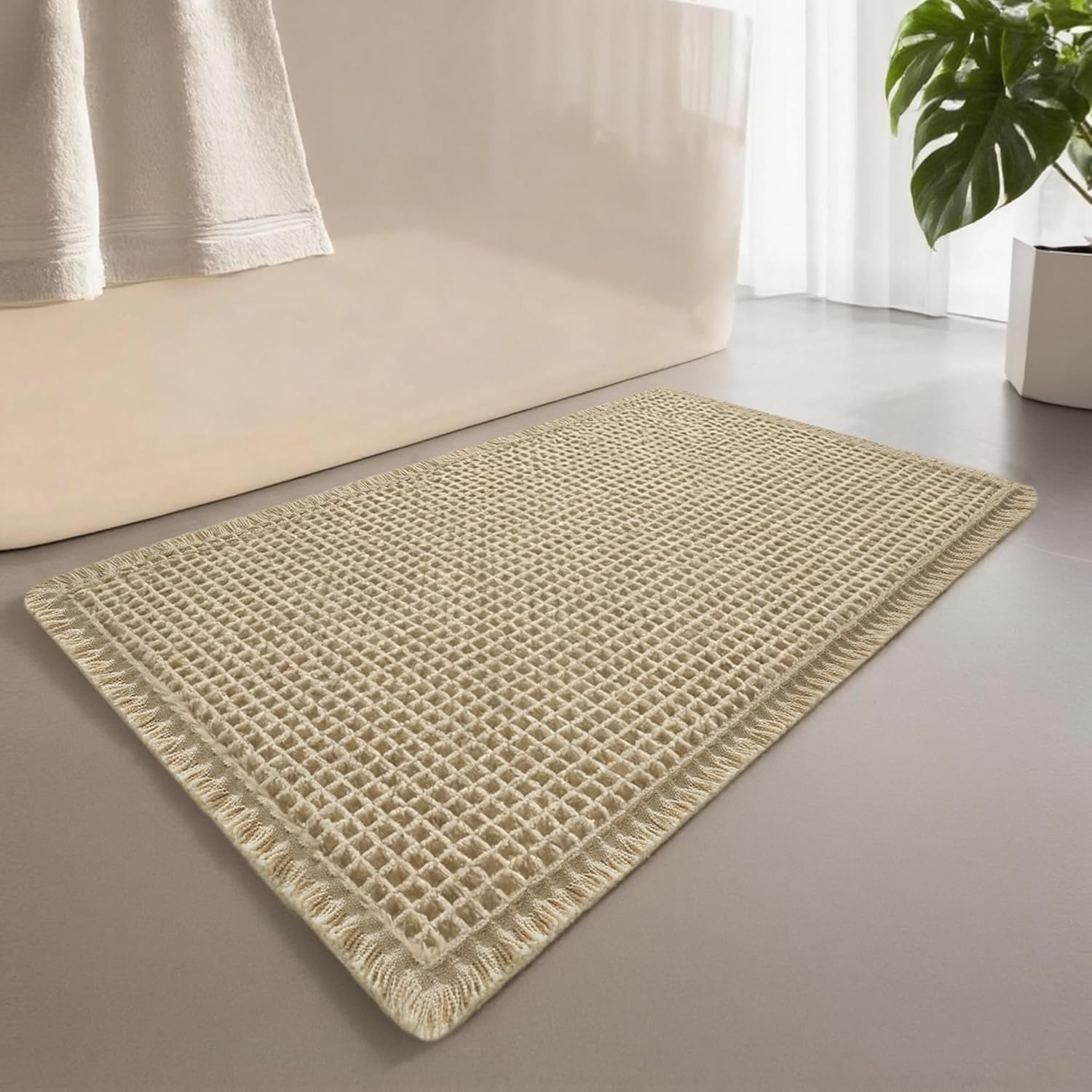 Cosinst Waffle Bath Mat 46X77Cm Super Absorbent Non Slip Comfortable Carpet for Tub, Shower Room, Machine Wash Quick Dry Bath Rugs with Tassels, Rubber Backed Bathroom Mats, Ultra Soft, Brown