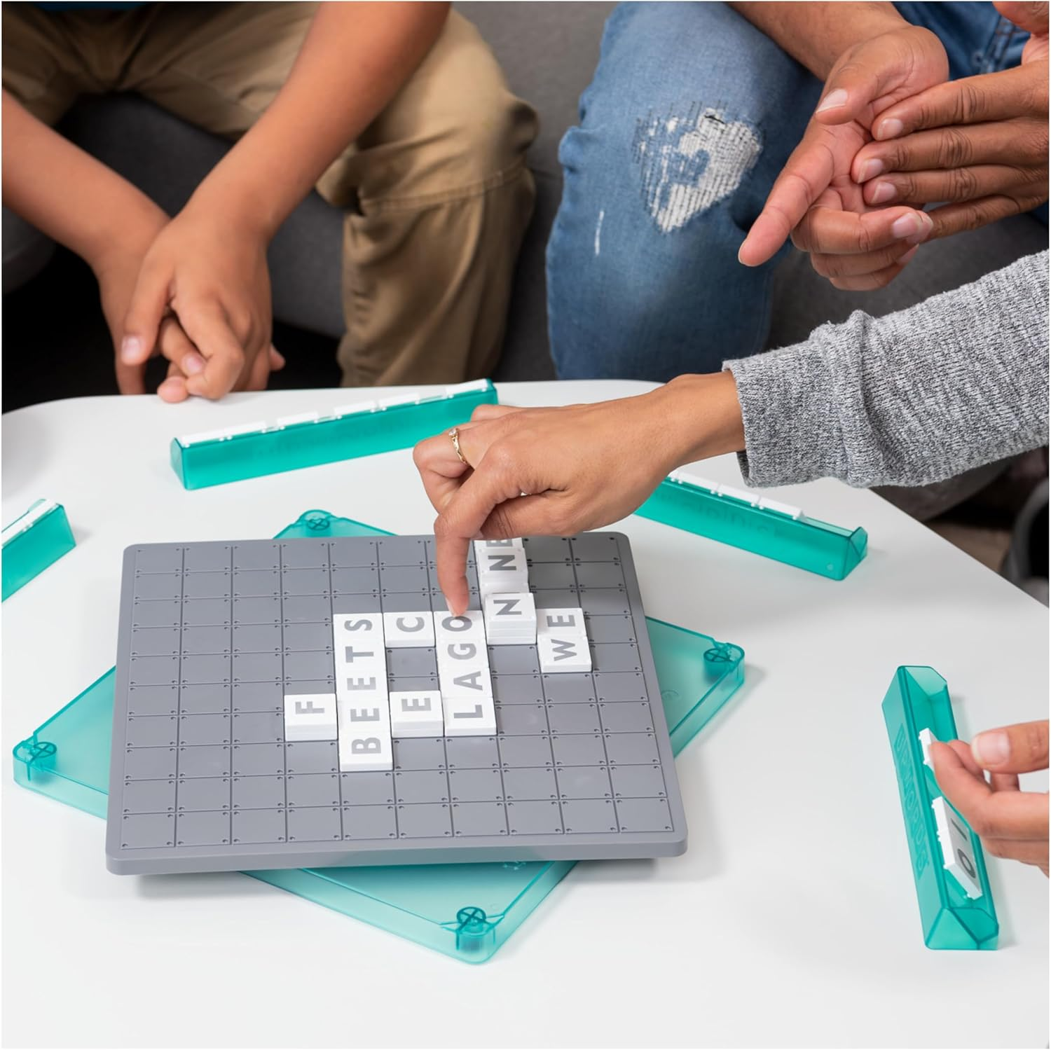 Upwords, Fun and Challenging Family Word Game with Stackable Letter Tiles, for Aged 8 and Up image number 4