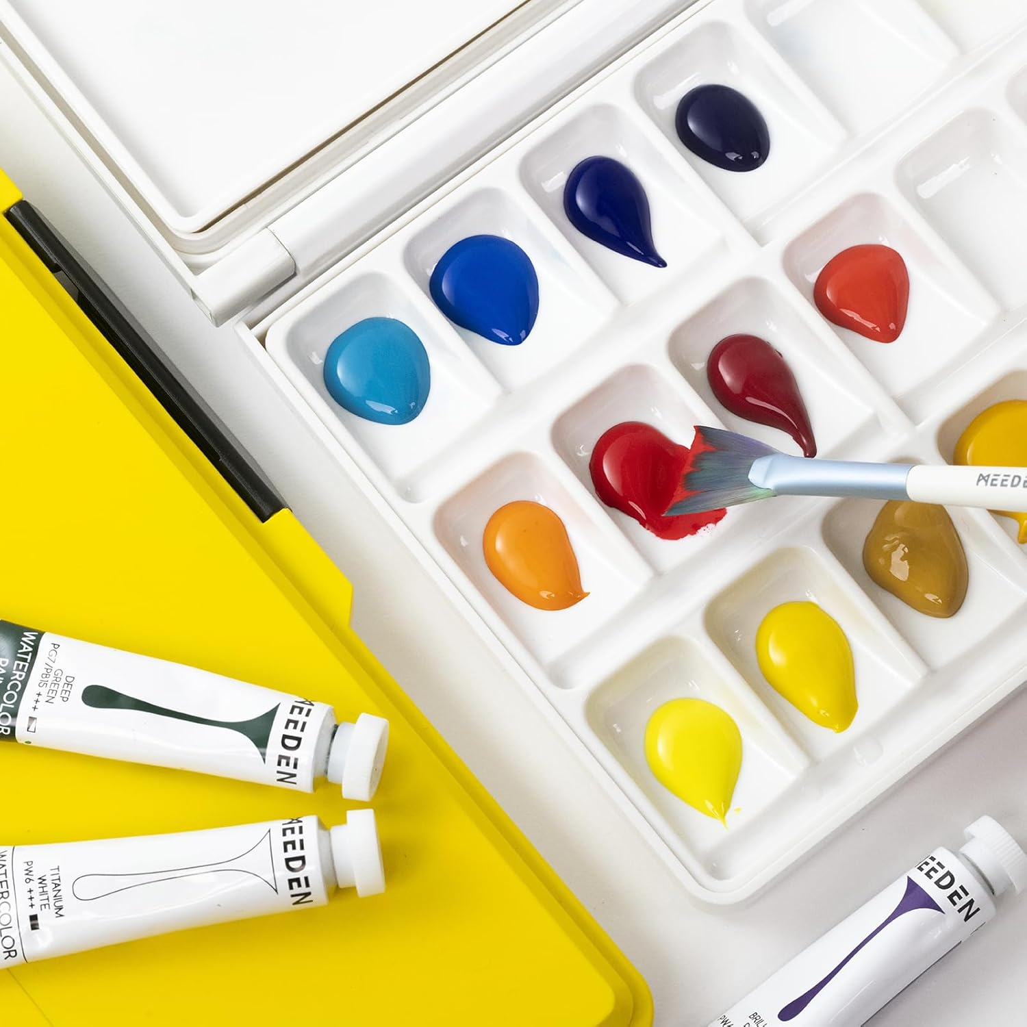 MEEDEN Airtight Watercolour Paint Palette: Leakproof Portable Travel Palette with Lid - 33 Wells Folding Palette with Large Mixing Tray for Watercolor, Gouache, Acrylic Paint (Yellow) image number 1