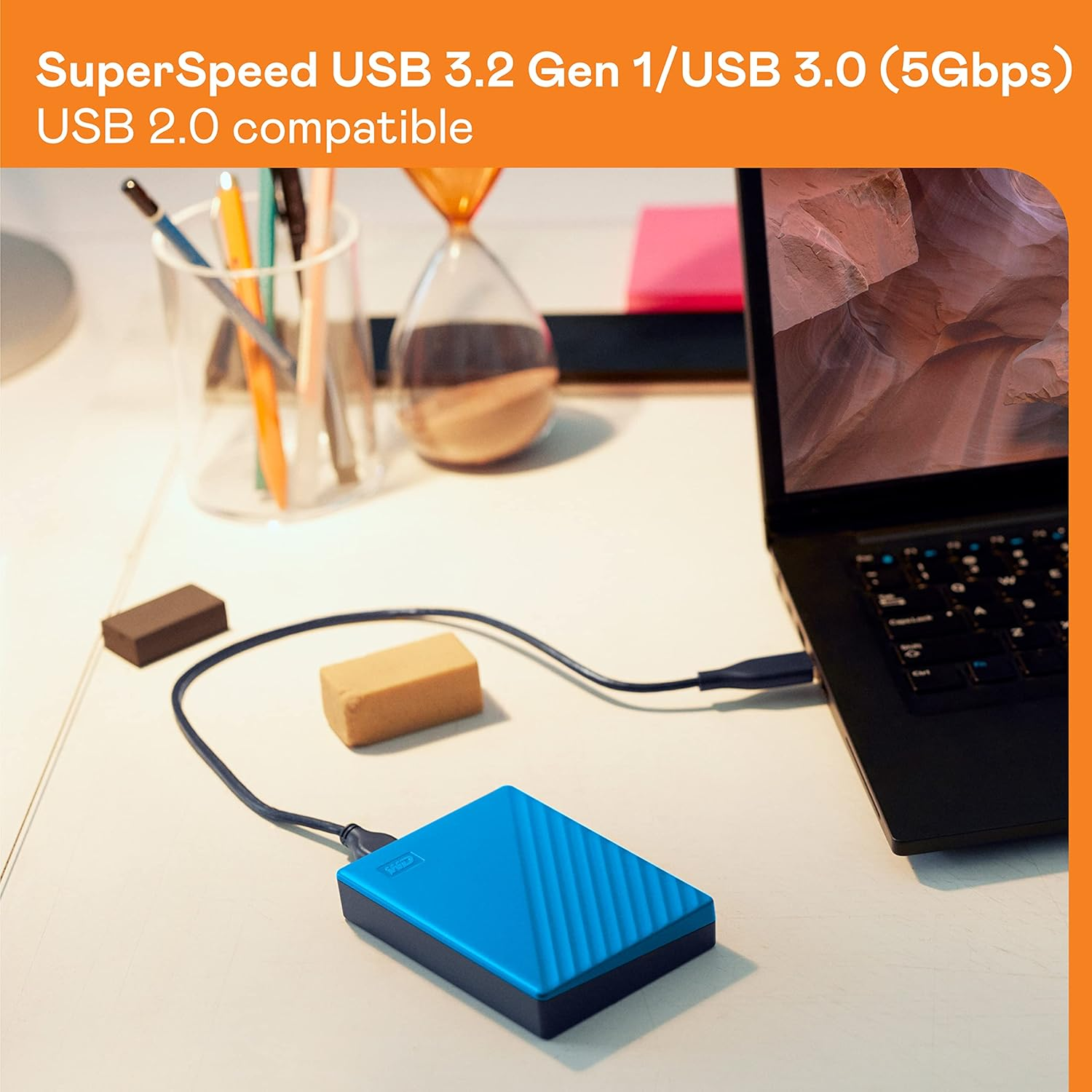 WD 6TB My Passport, Portable External Hard Drive, Blue, Backup Software with Defense against Ransomware, and Password Protection, USB 3.1/USB 3.0 Compatible - WDBR9S0060BBL-WESN image number 1