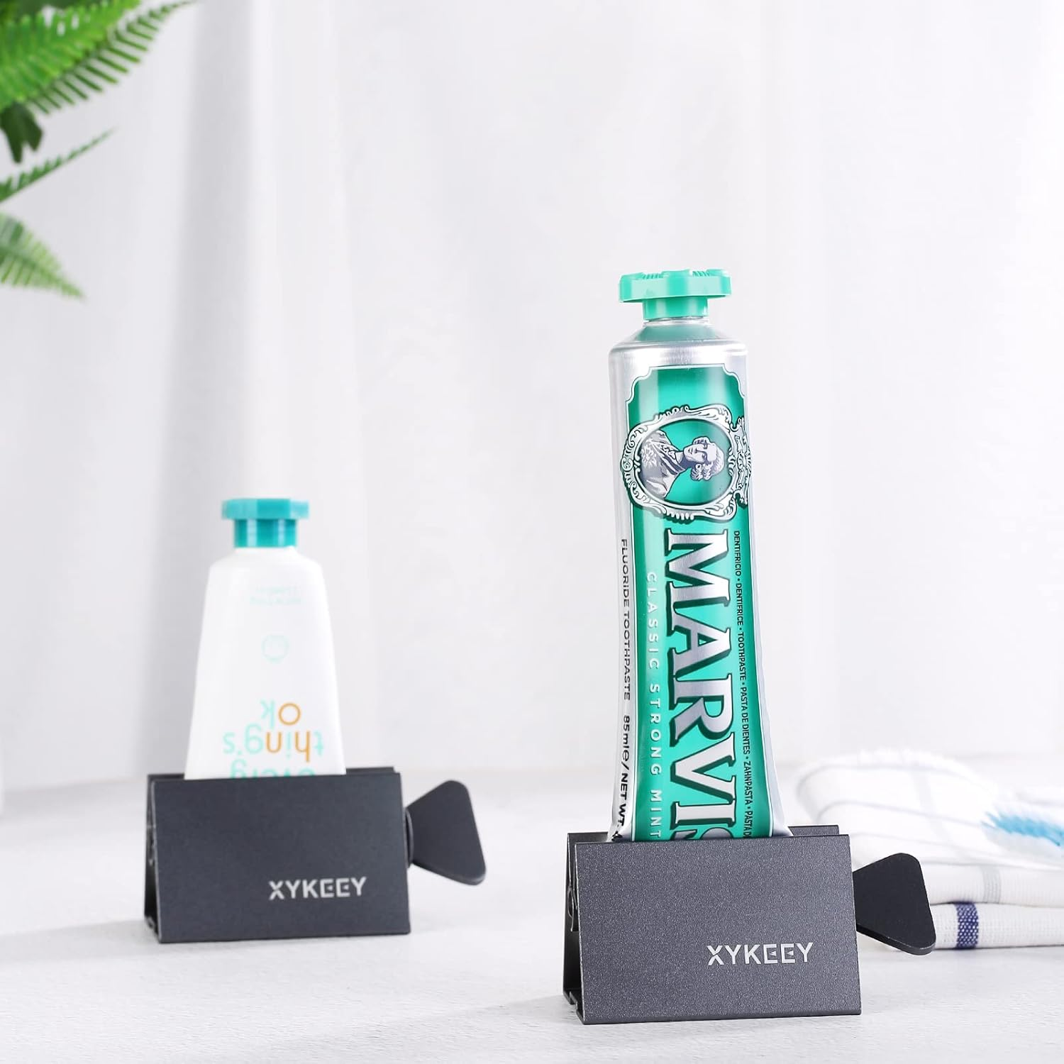 XYKEEY Toothpaste Tube Squeezer - Set of 2 Toothpaste Squeezer Rollers, Metal Toothpaste Tube Wringer Seat Holder Stand (Gray) image number 2