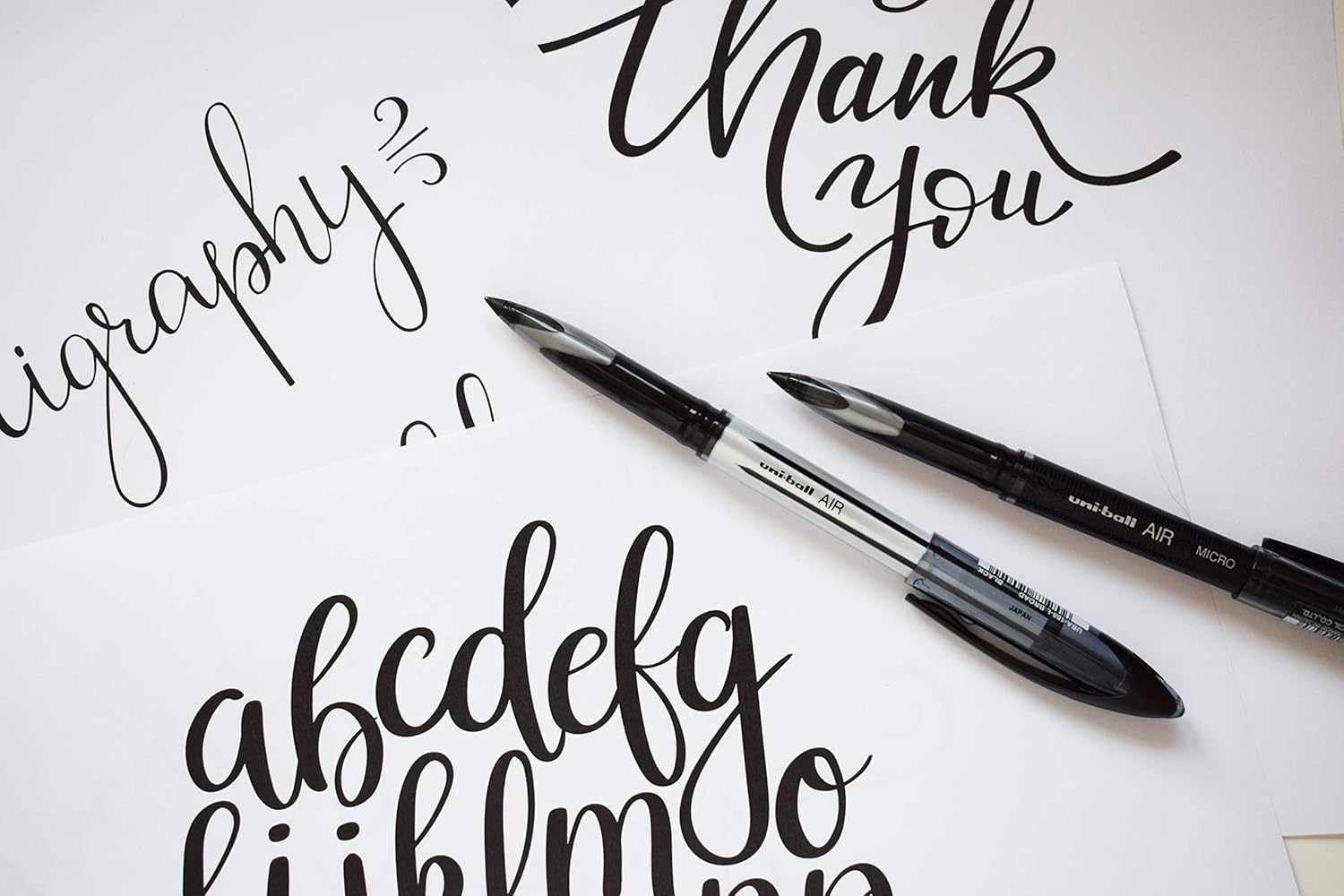 Uni-Ball UB-188-L Rollerball Pens. Premium 0.7Mm Medium Nib for Super Smooth Handwriting. Writes like a Fountain Pen. Fade and Water Resistant Liquid Uni Super Ink. Box of 12 Blue Ballpoint Pens image number 1