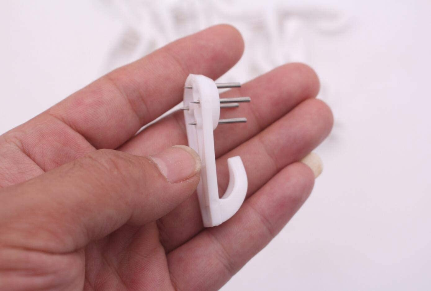 20PCS White Powerful Concrete Hard Wall Drywall Picture Hooks Non-Trace Hanging Hook Traceless Nail Plastic Wall Hook for Picture Photo Frame Clock Hangers(5Cm/1.97 Length) image number 6