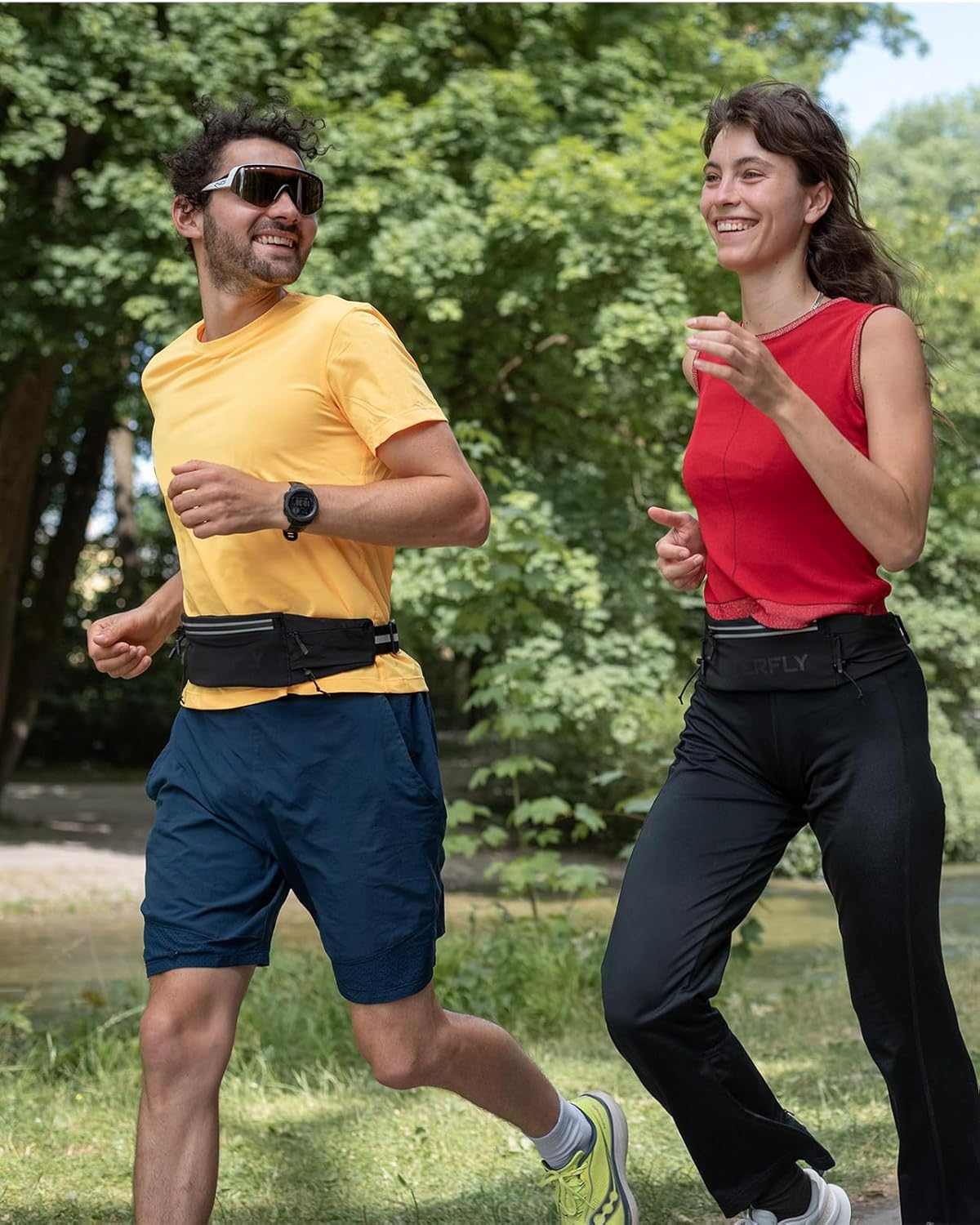 WATERFLY Running Belt Fanny Pack: Breathable 3 Pocket Waist Bag for Men Women Workout Exercise Fitness Phone Holder Fits ALL Phones - Runner Marathon Jogging Race Belt with Bib Clip Black image number 2