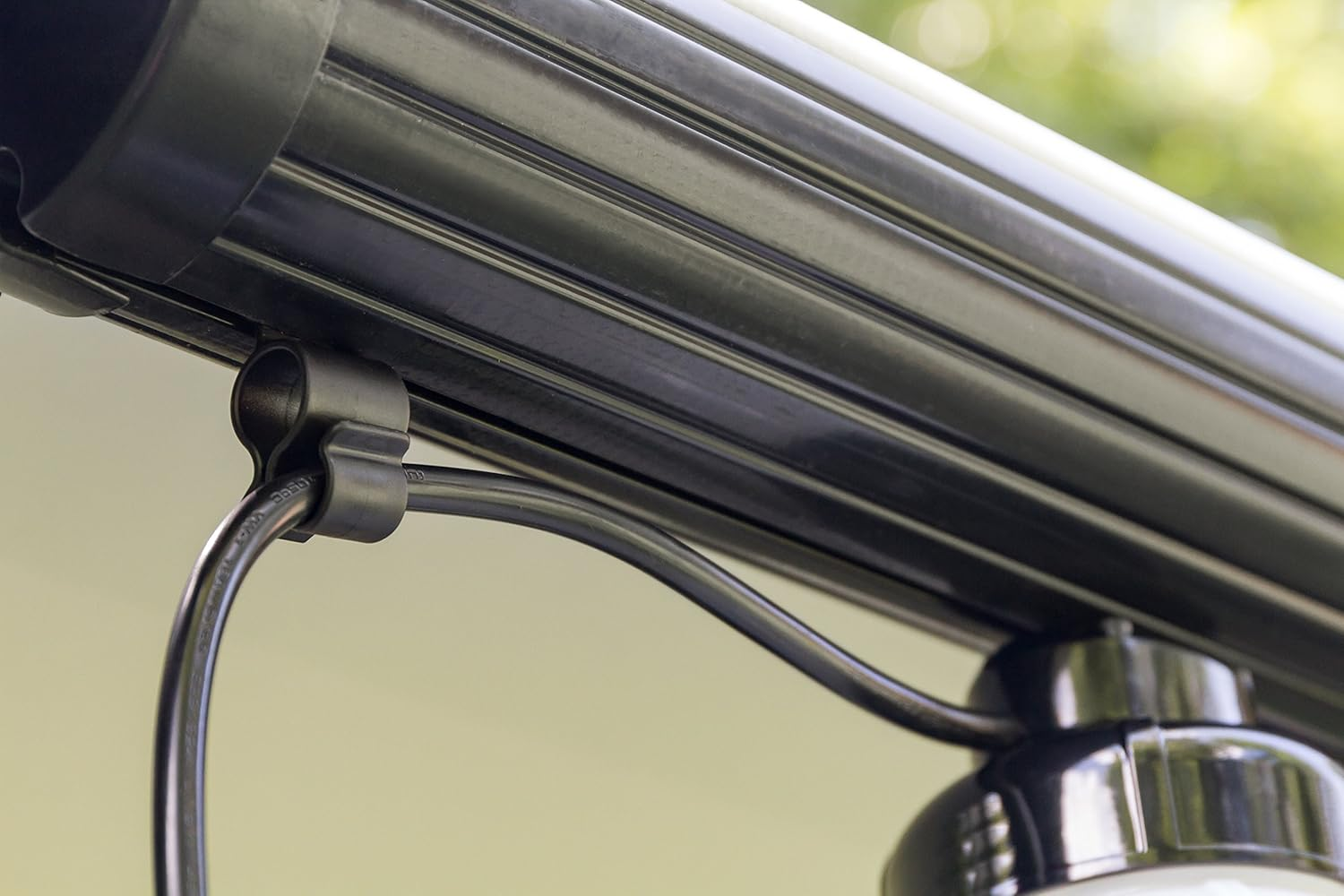 Camco Black Standard Awning Clip for Rope Light - Slides into Awning Roller Bar Channel to Create a Convenient Hook | Two Hanging Positions | Holds Party Lights, RV Lights, String Lights - (42708) image number 2