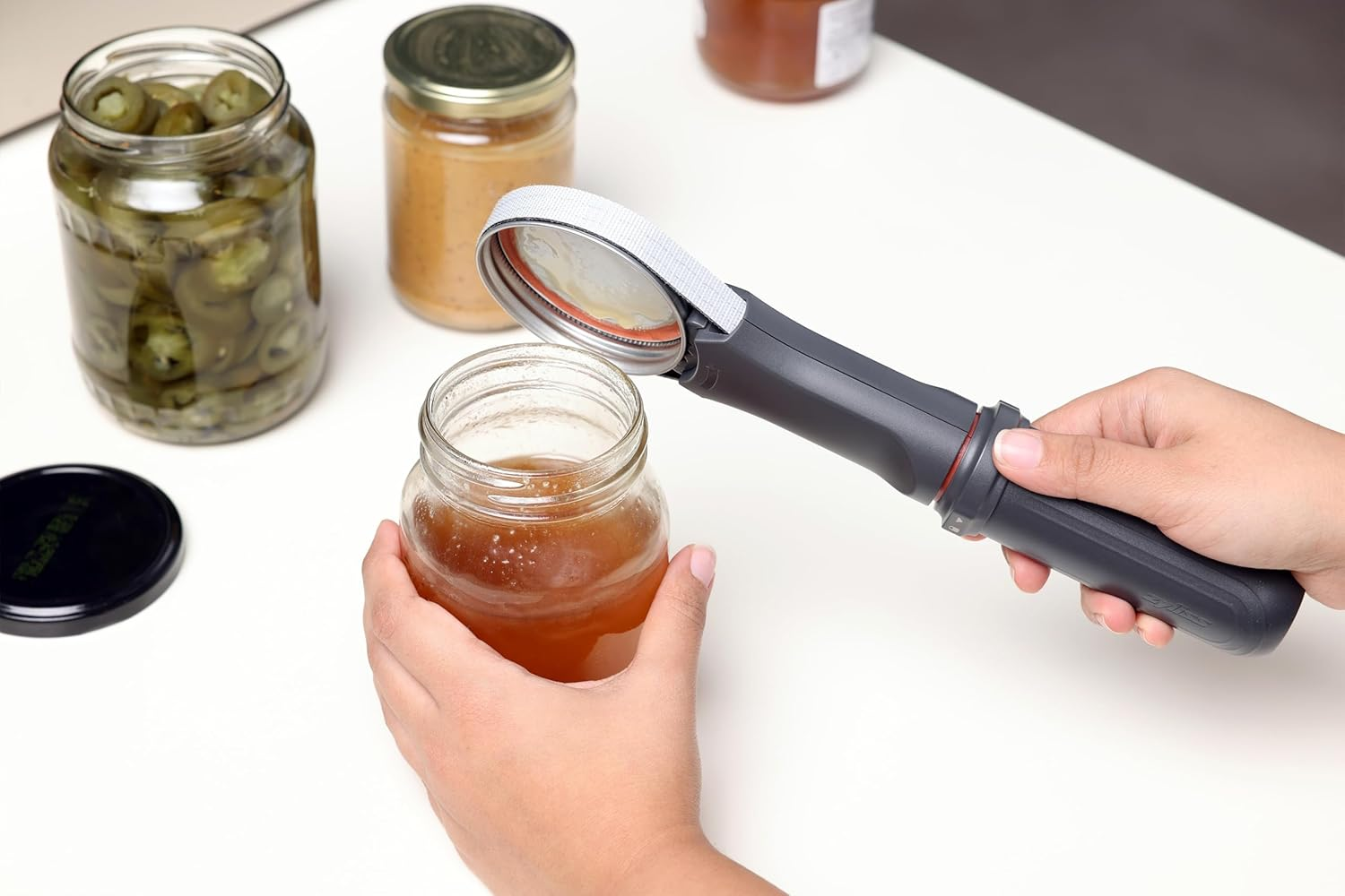 Zyliss Jar Opener - Effortlessly Opens Jars of Any Size with Minimal Effort, Adjustable Loop, Designed for Maximum Leverage and Support. Durable and Easy-To-Use Tool for Effortless Lid Opening, Grey image number 1