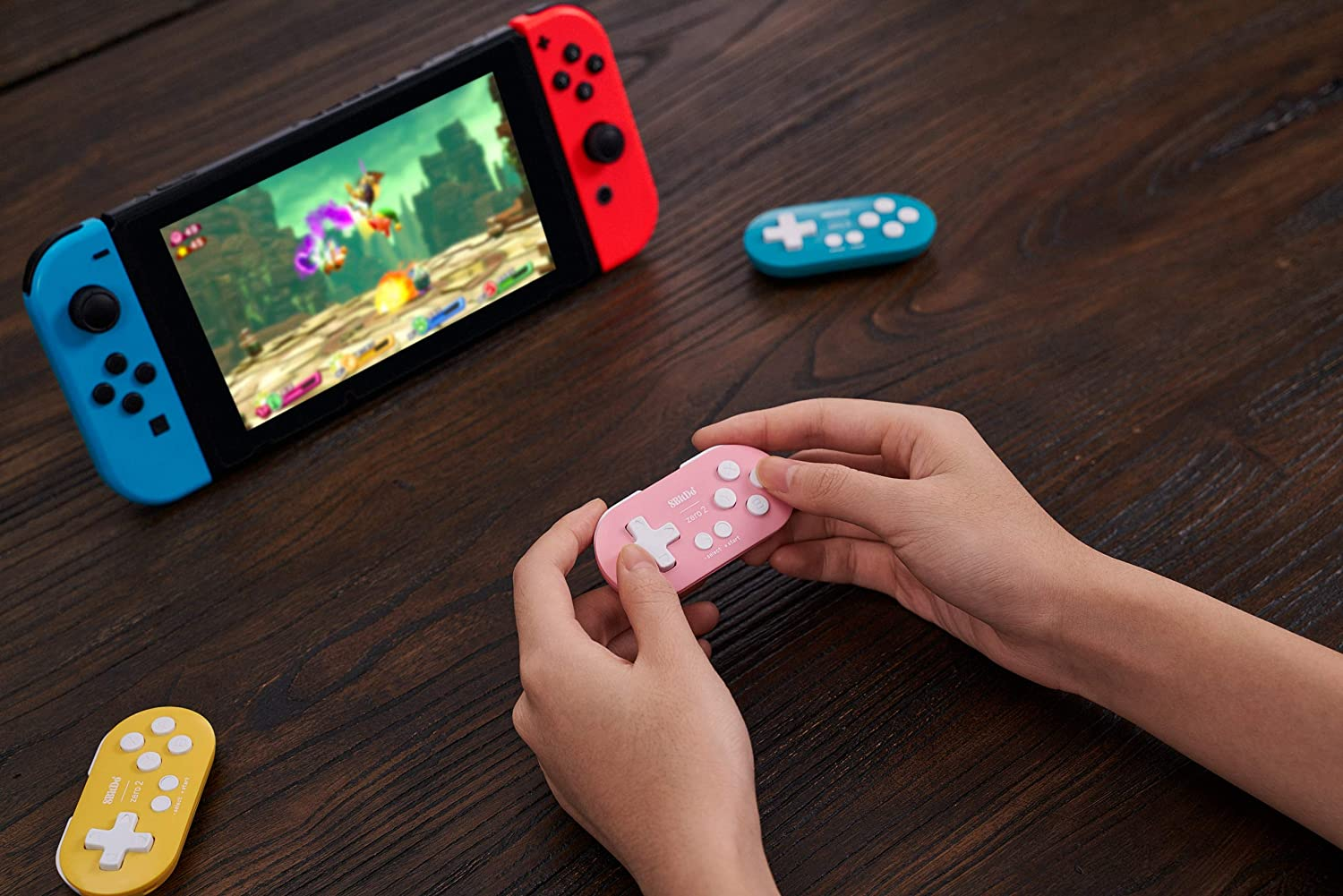 8Bitdo Zero 2 Bluetooth Gamepad Key Chain Sized Mini Controller for Nintendo Switch, Windows, Android, Macos with a Commemorative Brooch (Pink Edition) image number 1