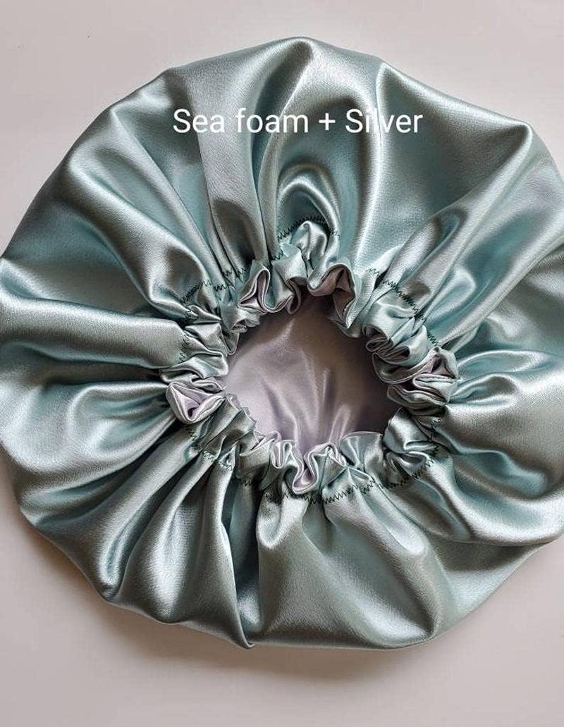 ANASVI Handmade Fully Reversible Luxuries Pure Satin Hair Bonnet Satin Sleep Cap (PACK of 1 ) (MEDIAM ADULT, SEA FOME -SILVER) image number 1