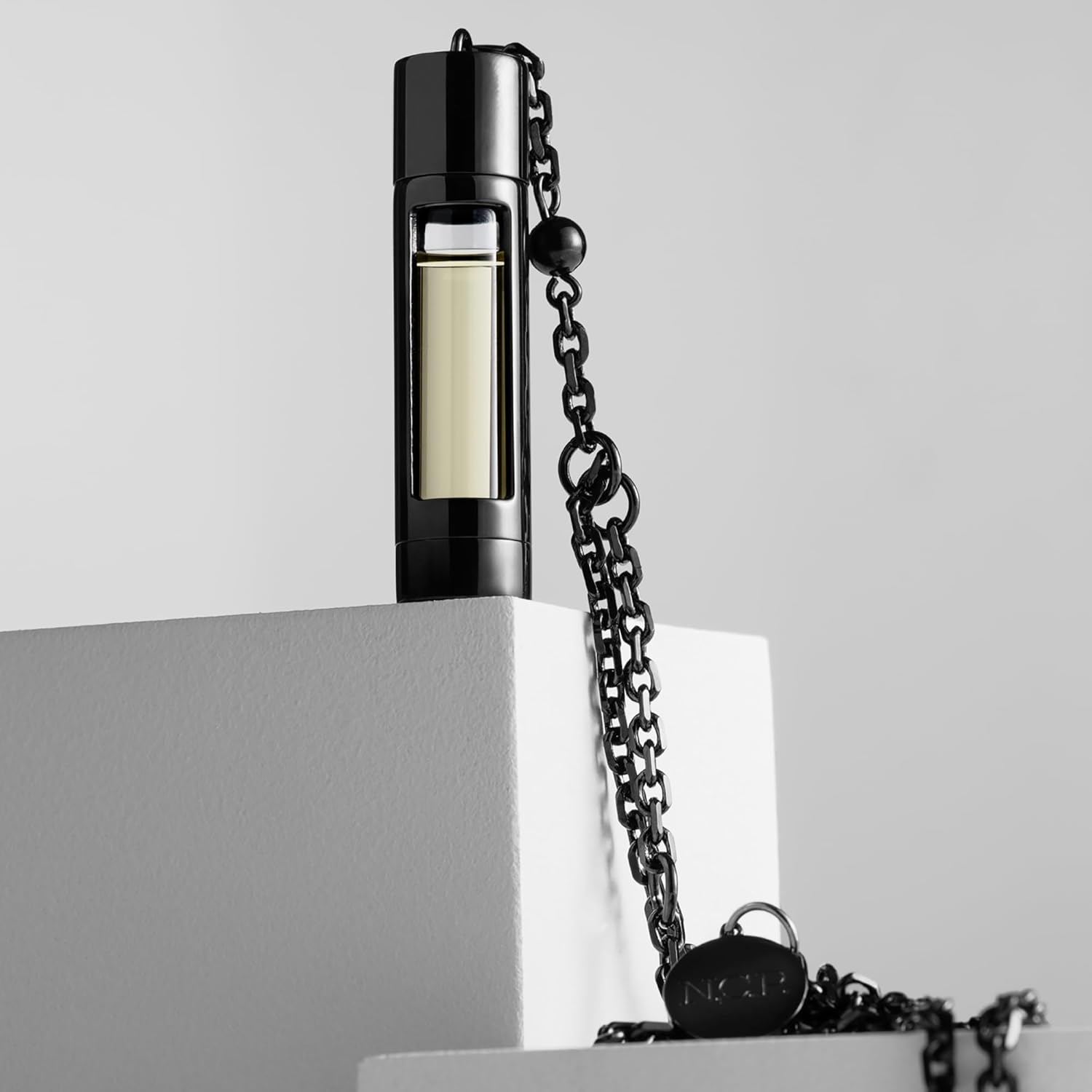 The Piece - Black by NCP for Unisex - 3 Pc 2 X 4.9Ml Olfactive Facet -701 Leather and Vetiver EDP Roll On, Necklace