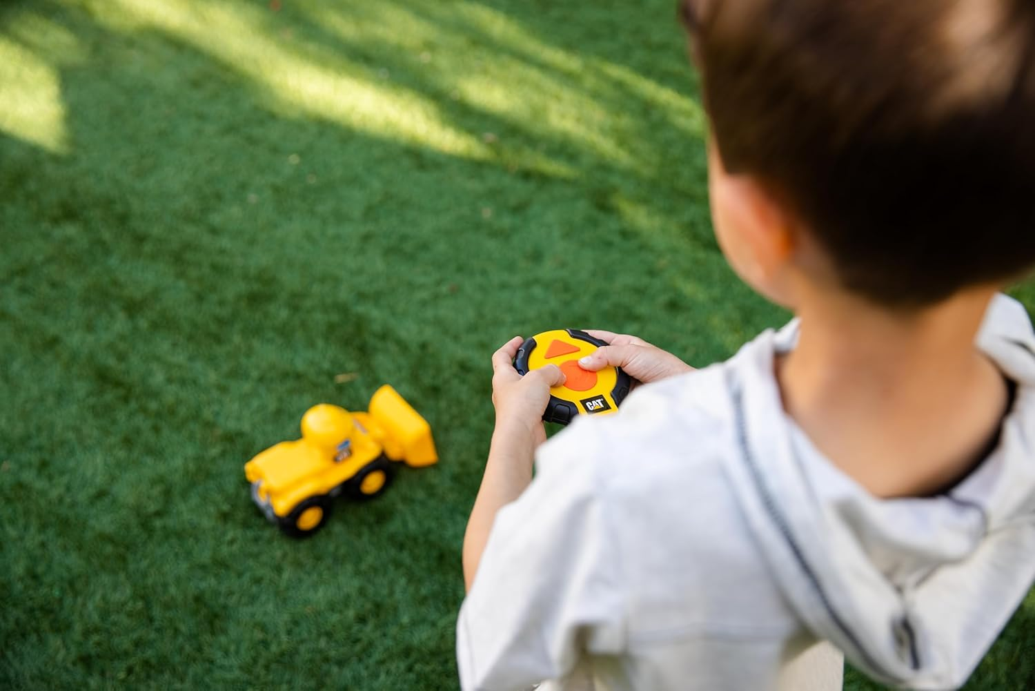 CAT Construction Toys, RC Remote Control Loader Truck - 10.5 Inch Length, Child Friendly Controller, Stowable Controller, Working Headlights - Batteries Included! image number 4