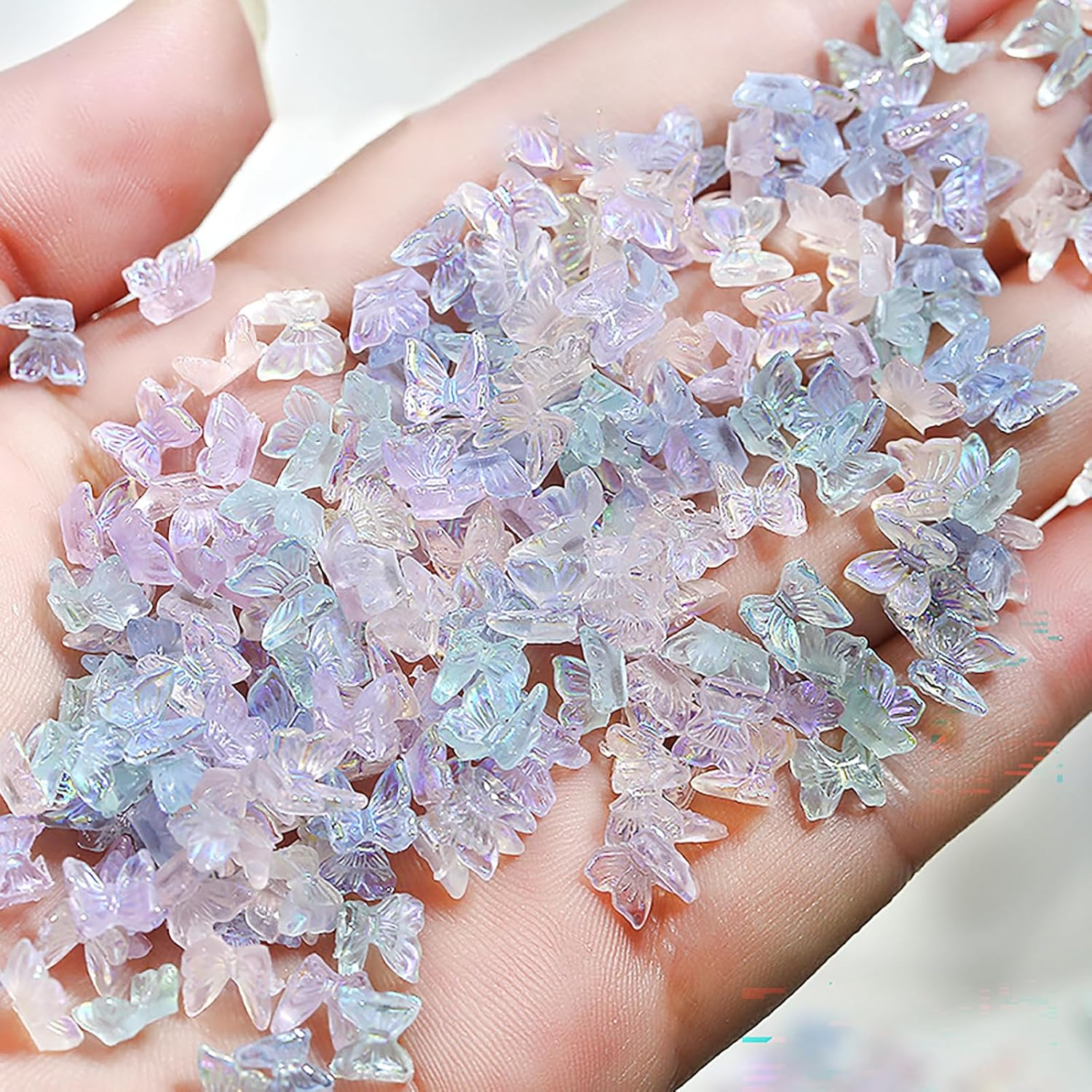 Taoluwin 100Pcs Nail Art Rhinestones, 6Mm 3D Iridescent Resin Butterfly Gems, Rhinestones for Nail Charms, Crafts & Jewelry Making, 7 Mixed Colors image number 1