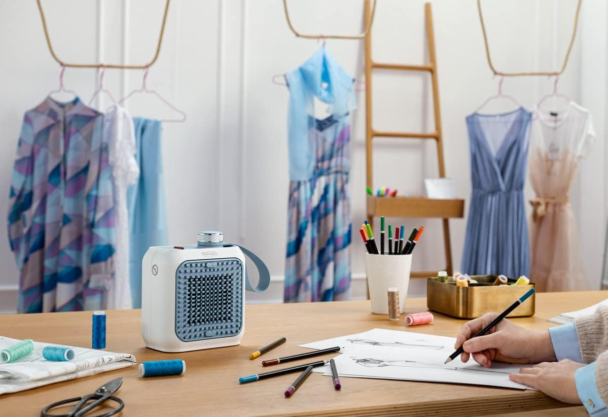 De'Longhi Capsule Desk Ceramic Fan Heater HFX10B03.LB, Quiet Mini Fast Heater, Adjustable Grille, Safety Thermostat, Ideal for Desk and Travel, 360 Watt, Light Blue