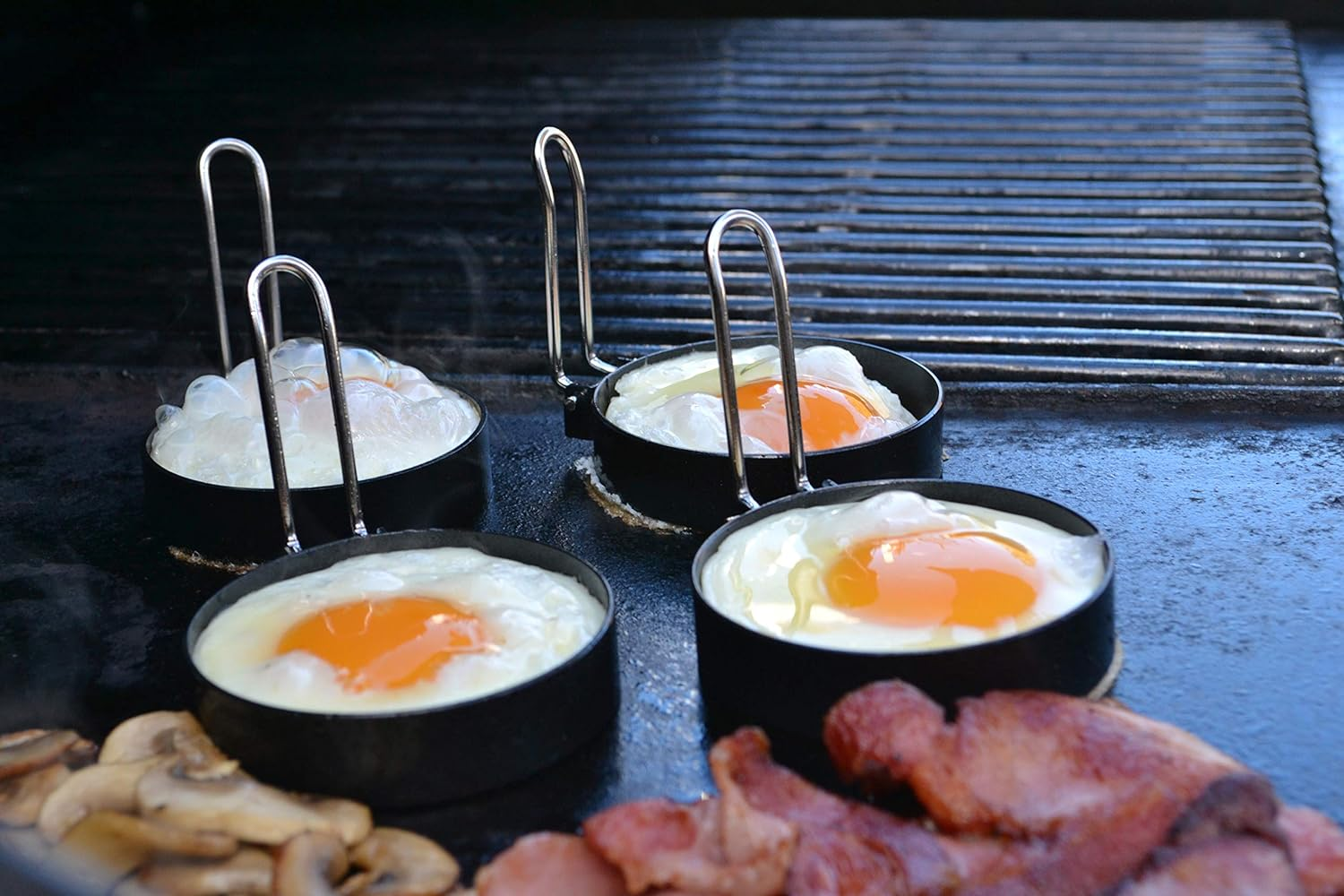 BBQ Buddy Egg Rings - BBQ Egg Mould for Hot Plate - Circular Crumpet Rings and Egg Rings for Frying Eggs and Pancakes - 75Mm Diameter Non Stick with Foldable Handle - 4 Pieces