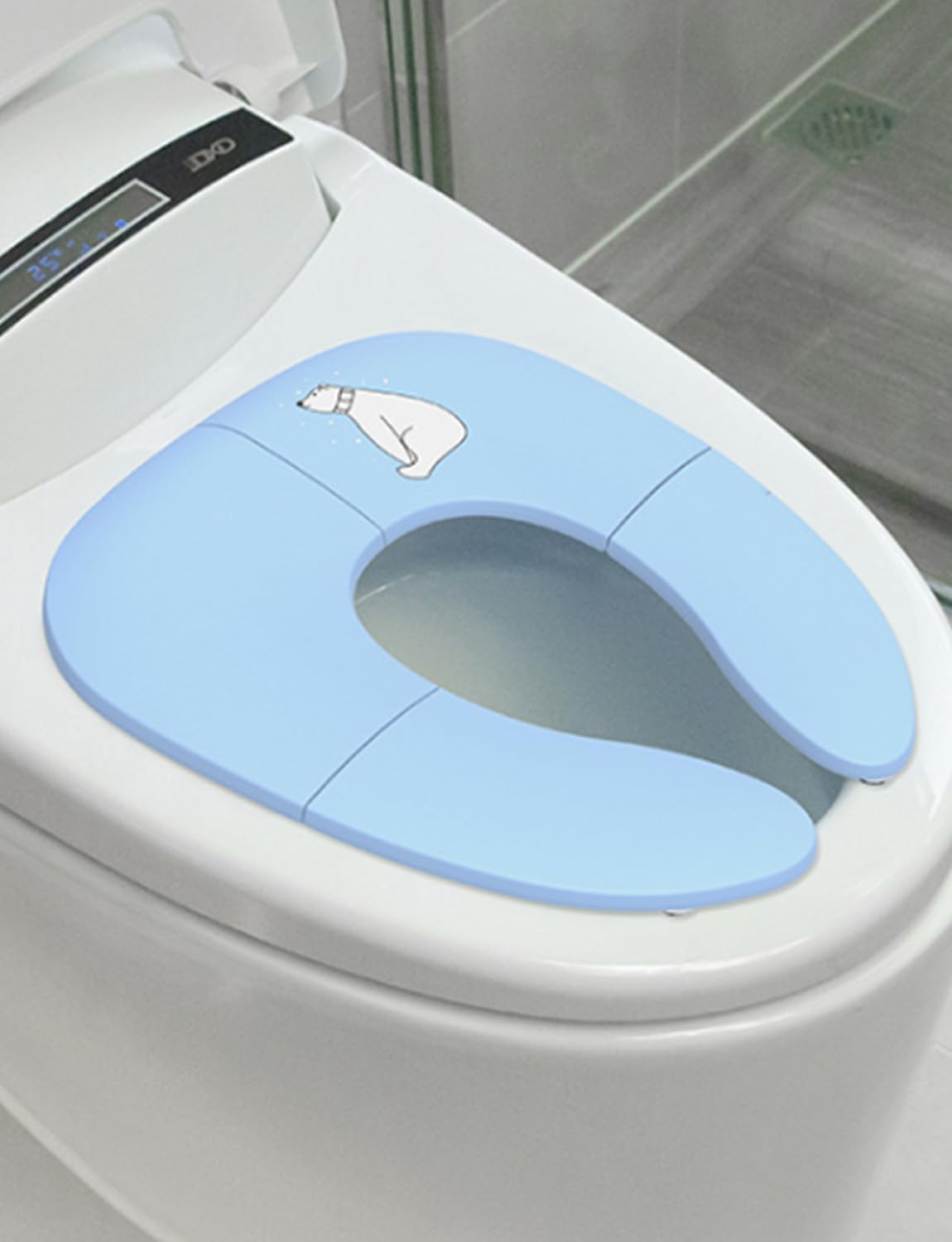The Foldable Toilet Training Seat Includes a Travel Carrying Bag, a Portable Toilet Seat with an anti Slip Base and Ergonomic Handle, and a Universal Seat Suitable for Round/Oval Toilets image number 2
