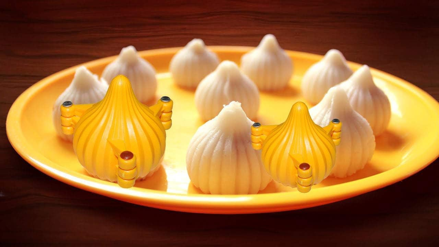 Garden of Arts Plastic 2 Pieces Small and Medium 3 Fold Modak Maker Mould for Ganpati, Diwali, Dussehra, and Other Festival, Orange,7X7X2 Cm image number 2
