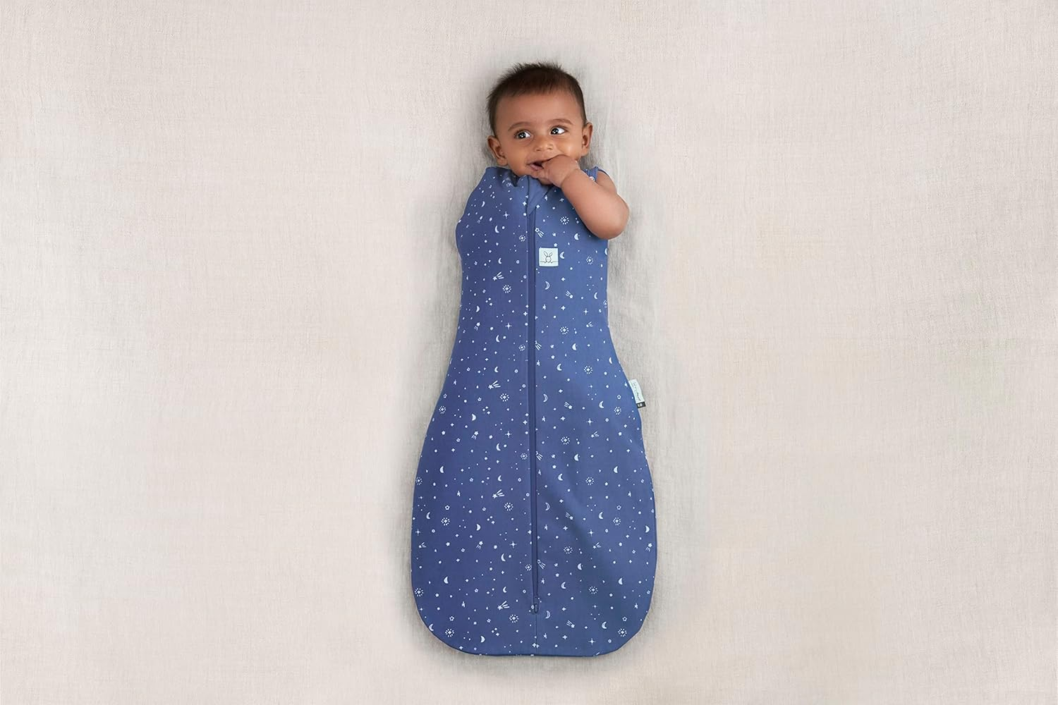 Ergopouch 1.0 TOG Cocoon Swaddle Bag, 6-12 Months, Night Sky Print &ndash; Organic Cotton, Two-Way Zip, Arms In/Out, All-Season Comfort, Ideal for Room Temperatures (20&ndash;24&deg;C) image number 1