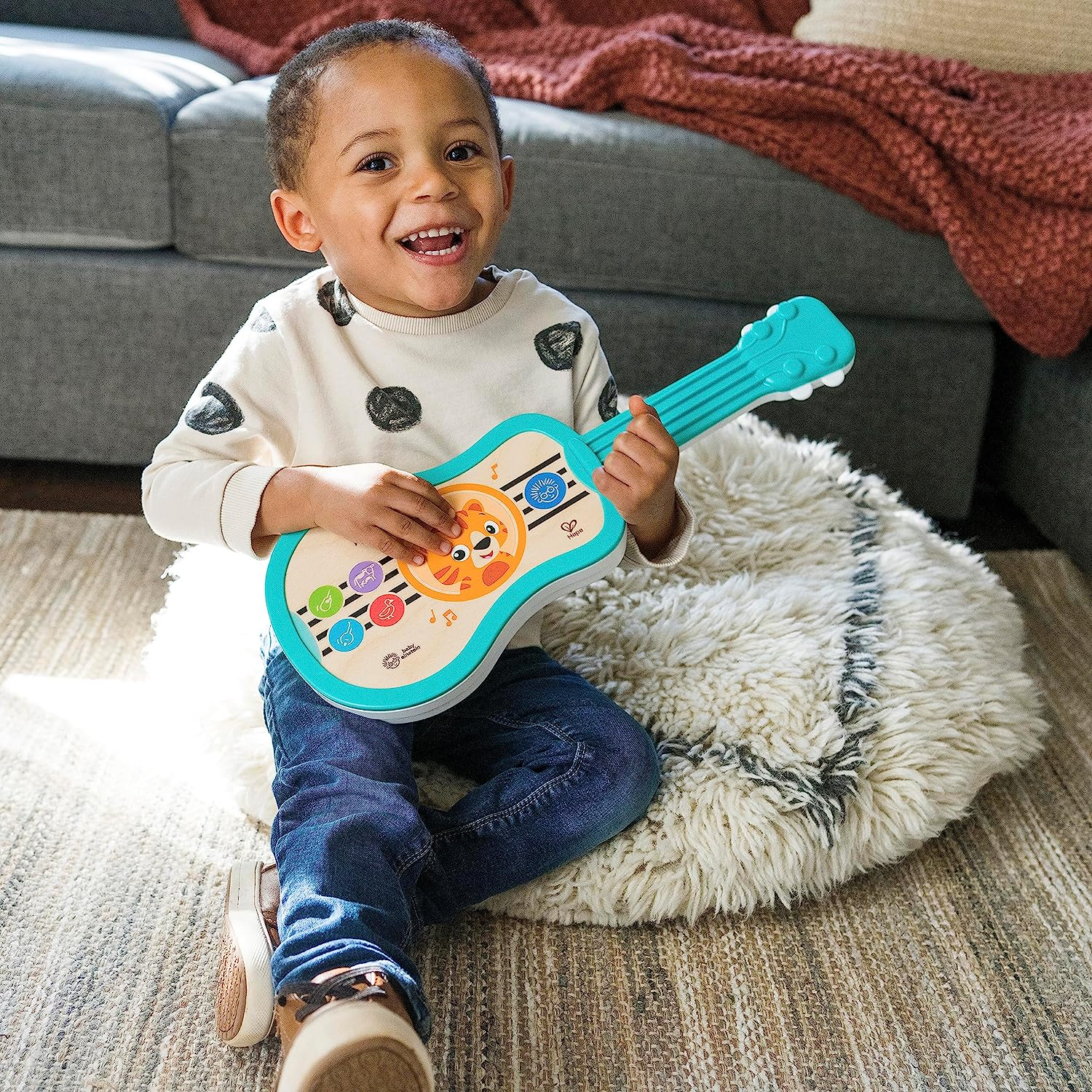 Baby Einstein Sing & Strum Magic Touch Ukulele Wooden Musical Toy, Ages 6 Months+, Multicolored image number 6