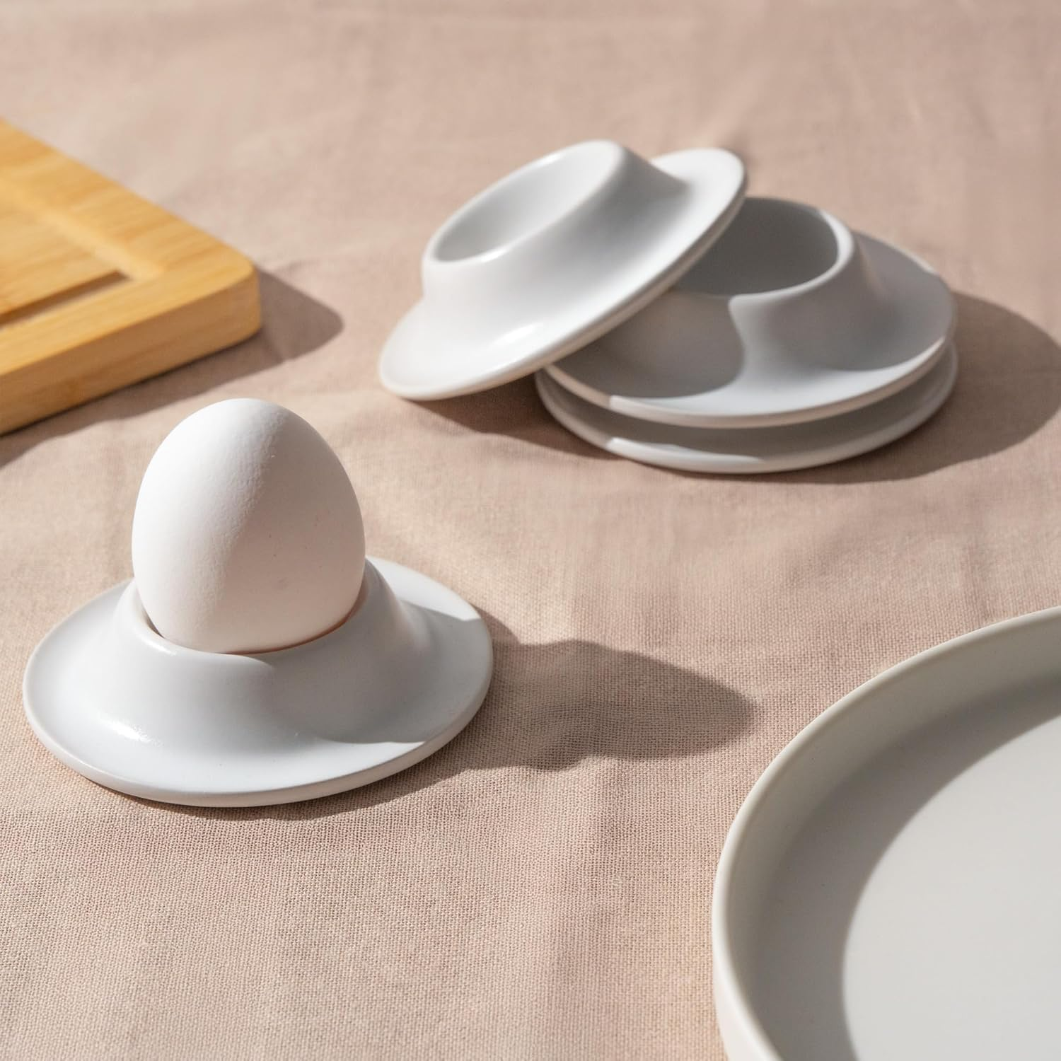 MIAMIO &ndash; Egg Cups 4-Piece Ceramic Set, Stoneware Egg Cups with Tray for Eggshells, Breakfast Egg Cup in Restaurant Quality &ndash; Dishwasher Safe (White) - Black image number 2