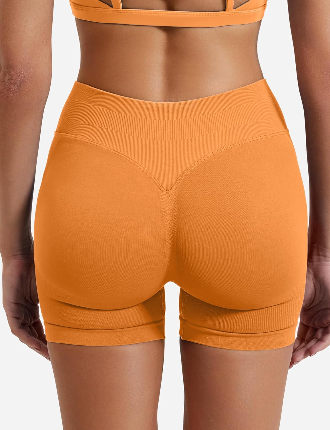 YEOREO Softhue Women Workout Gym Impact Shorts Hidden Scrunch Butt Lifting 4.5" Seamless Shorts Orange image number 1