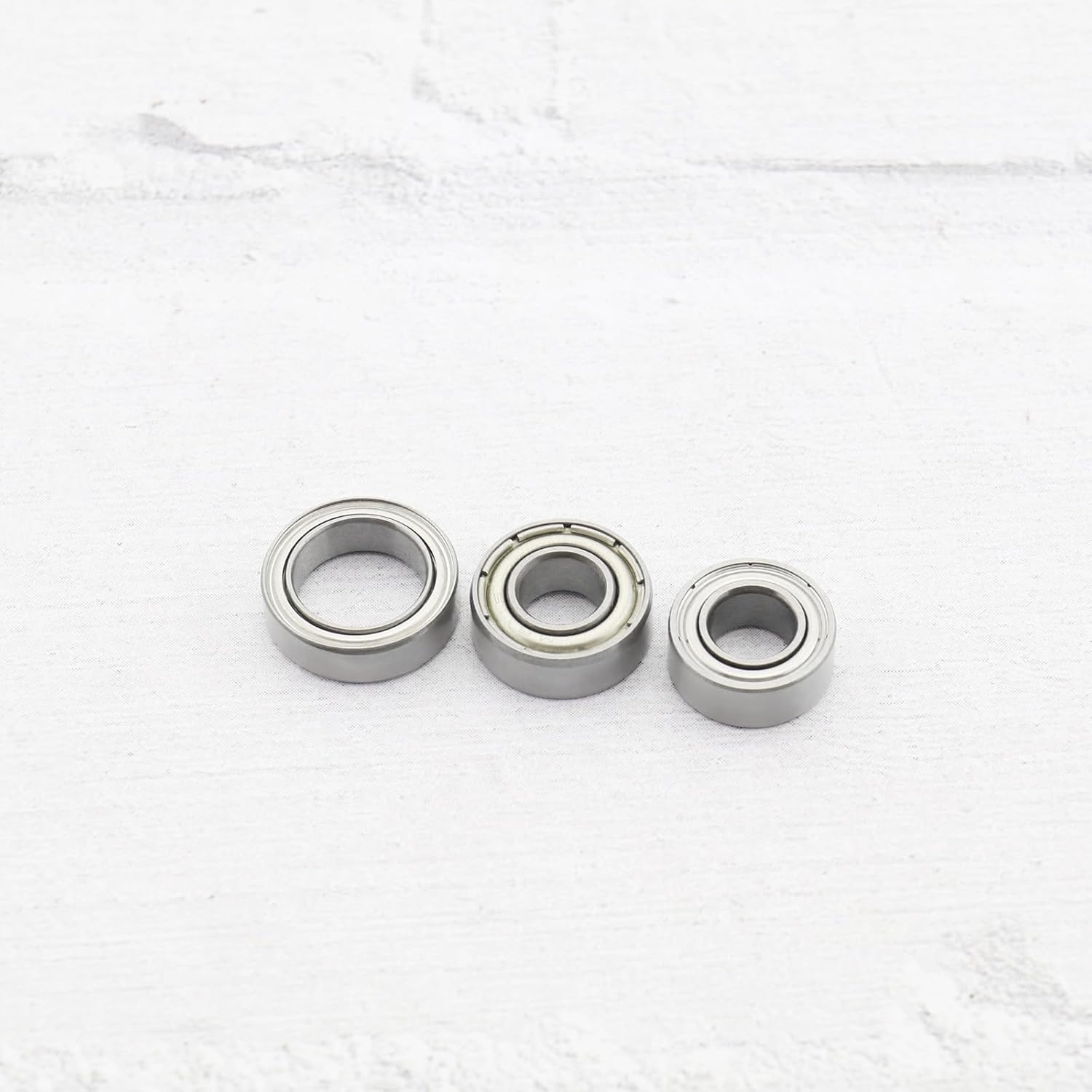 16Pcs RC Chassis Ball Bearing 10X5X4Mm 11X5X4Mm 12X8X3.5Mm Steel Ball Bearing Axle Set Compatible with TT-02 Chassis Ball Bearing Repair Kit image number 4