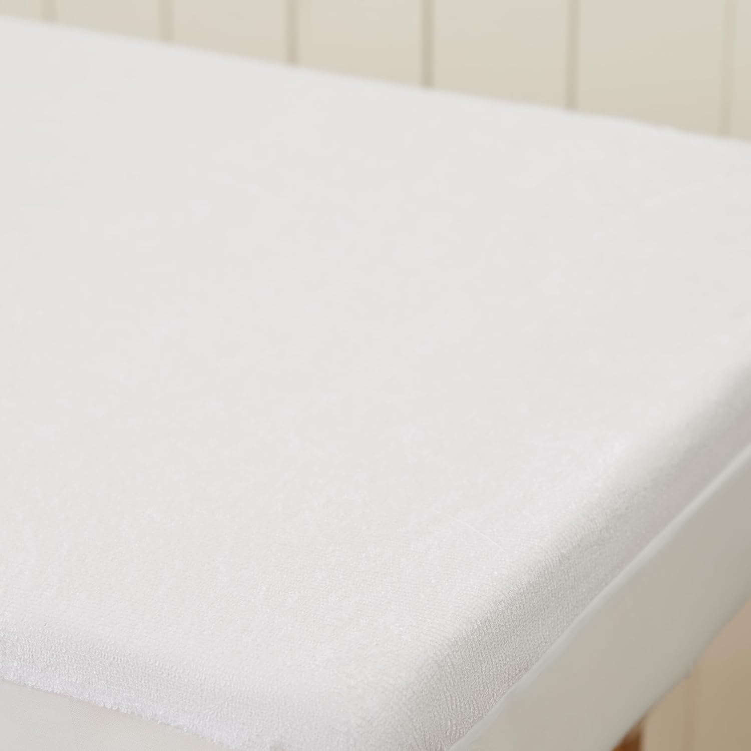 Dreamaker 150GSM Bamboo Terry Cot Waterproof Mattress Protector Comfortable Breathable Cover Natural Bamboo Helps to Regulate Temperature and Absorbs Moisture | Elastic Fitted White - Standard Cot image number 6